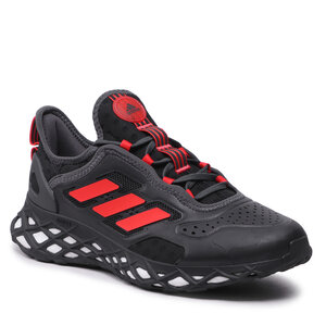 Scarpe adidas - The shoe boasts a bleached denim upper with red and black accents