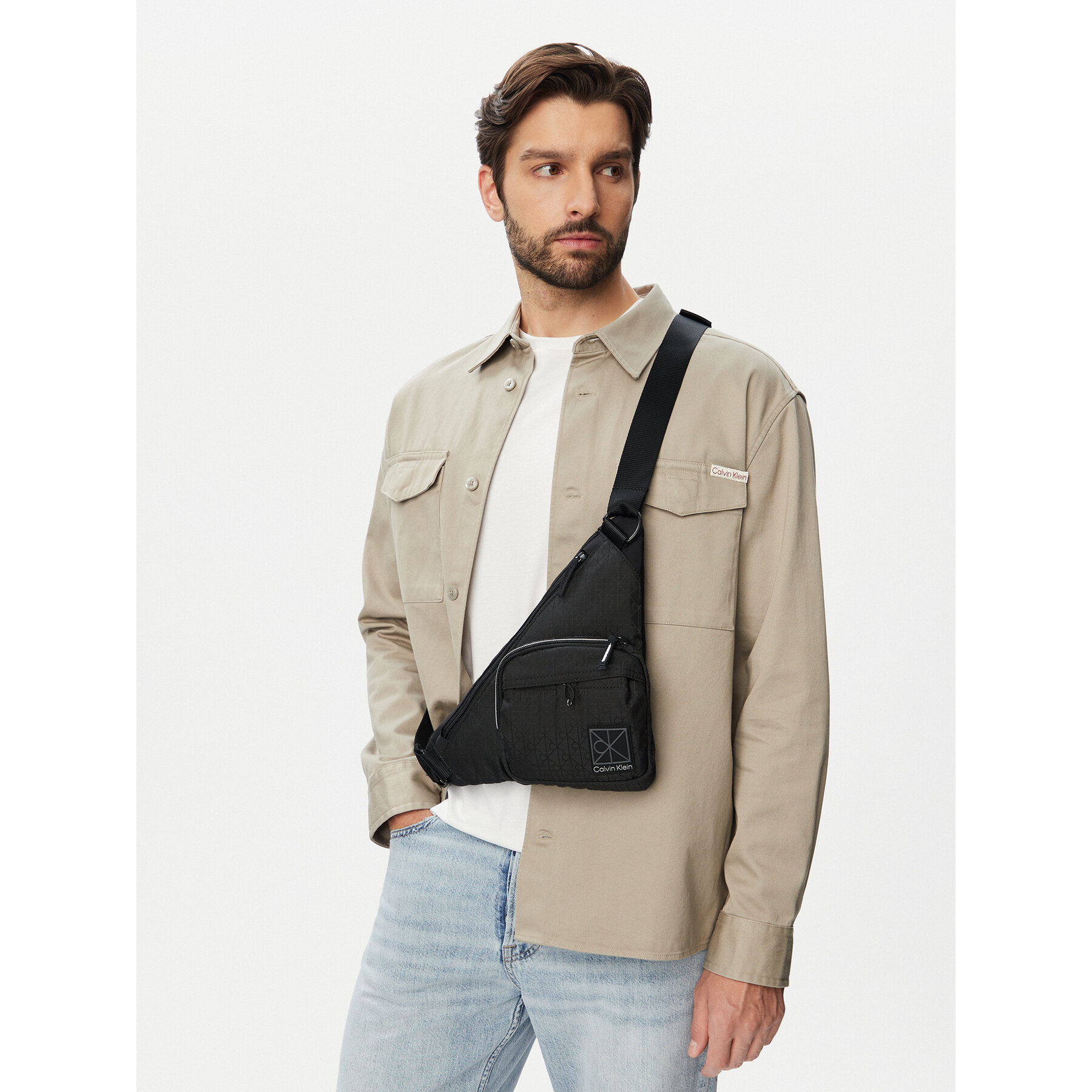 Crossover torbica Calvin Klein Utility Emblem Aop Crossbody LV04D3386G Crna