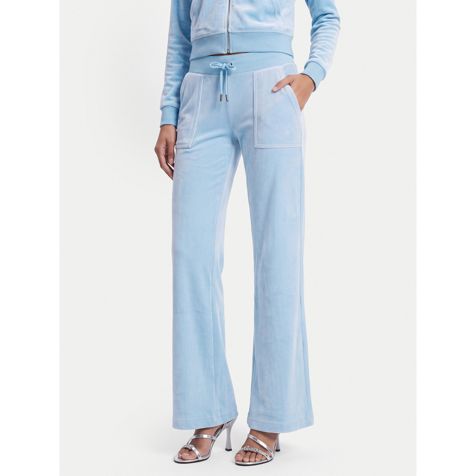 Juicy Couture Donji dio trenerke Layla JCSEBJ001 Svijetloplava Flared Leg
