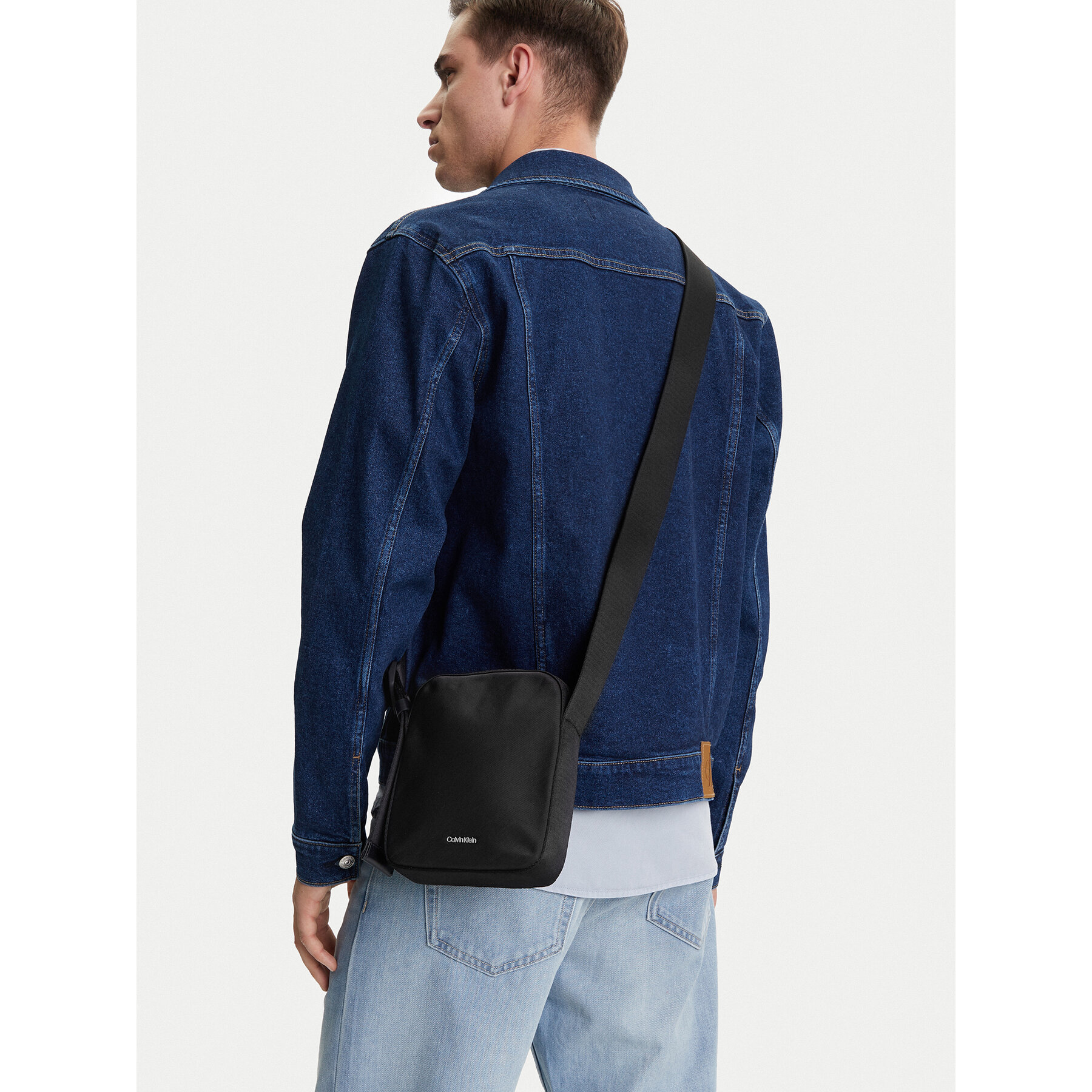 Somiņa Calvin Klein Ck Ease Reporter S K50K512886 Melns