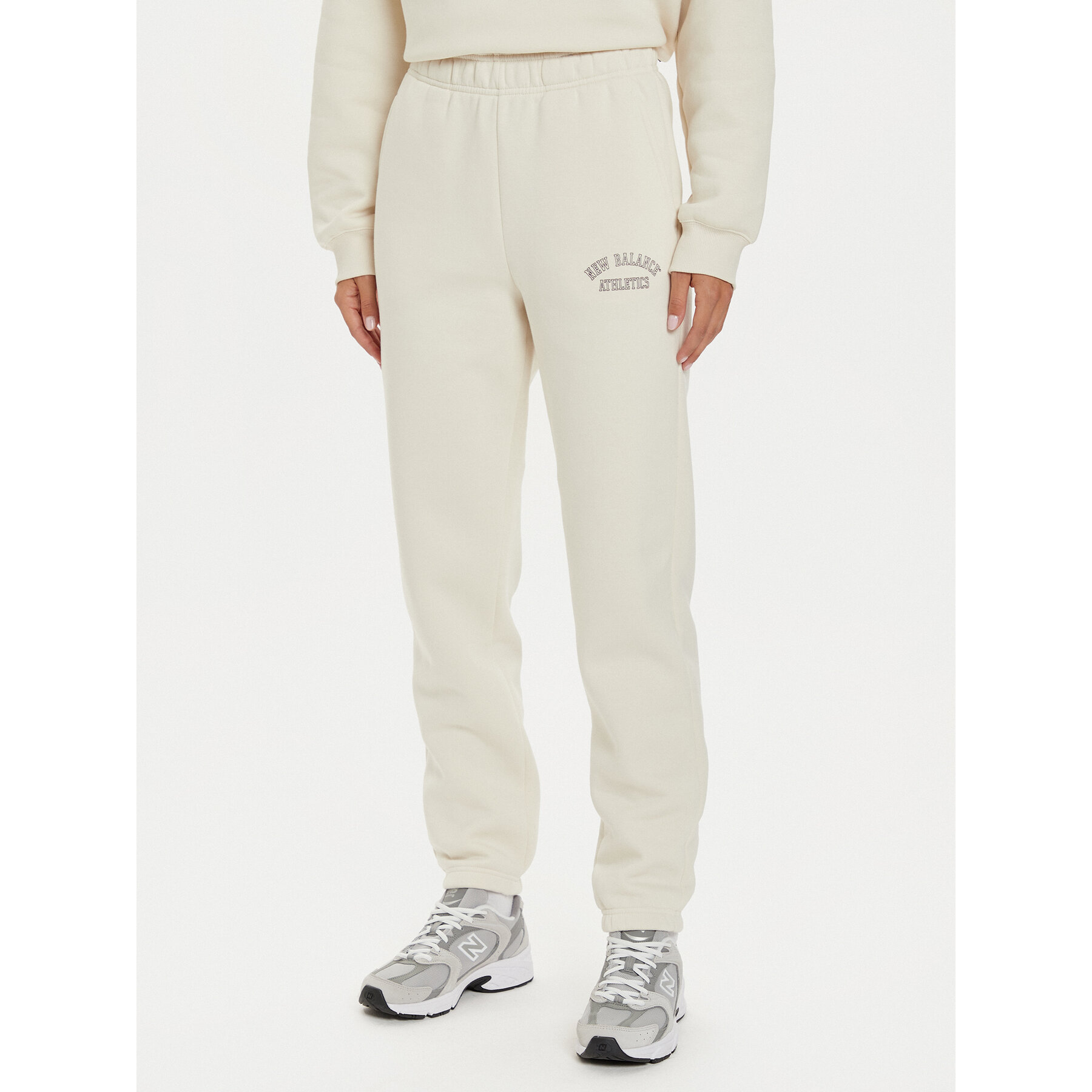 New Balance Jogginghose WP43500 Beige Relaxed Fit