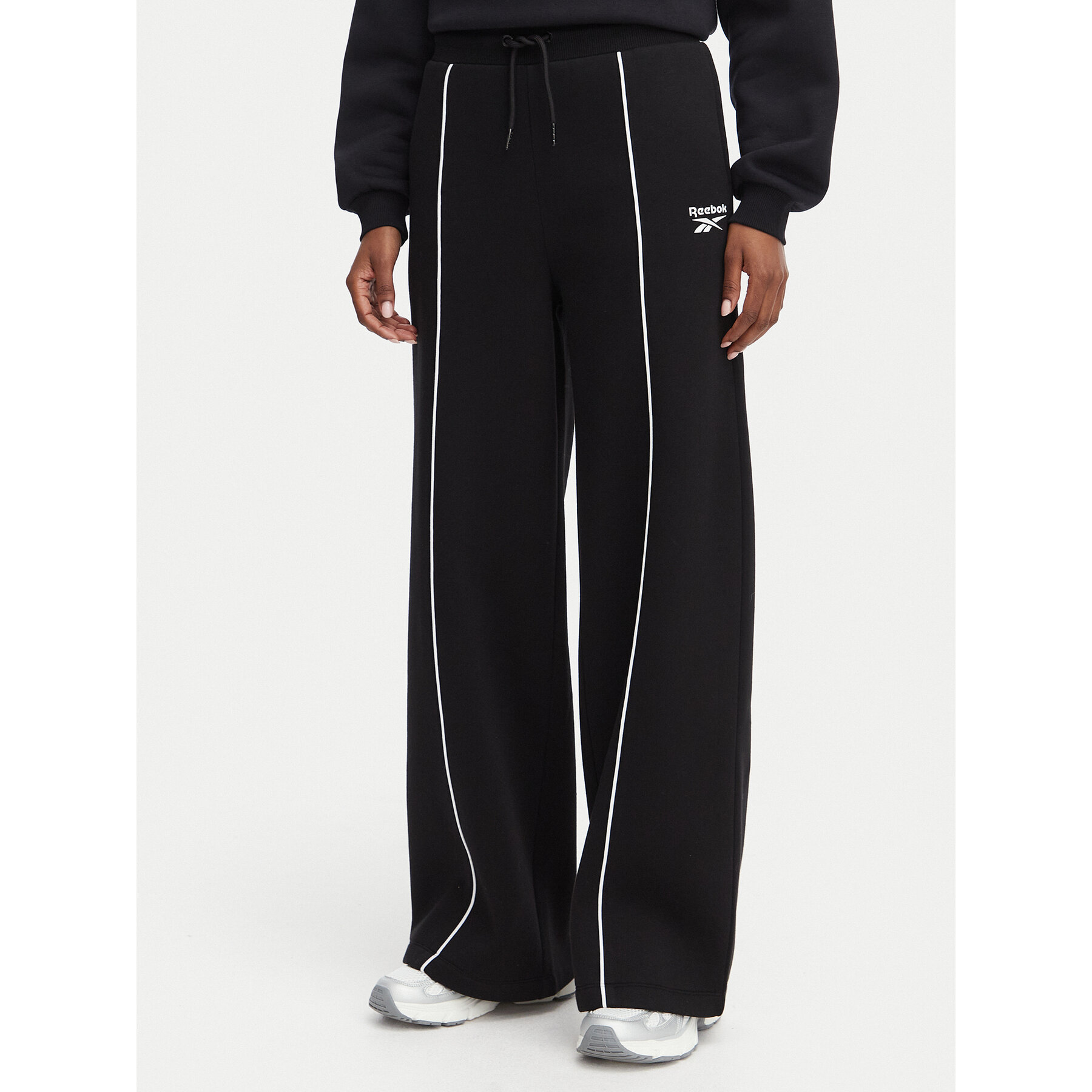 Reebok Donji dio trenerke Oliwia RK25683CCW Crna Regular Fit