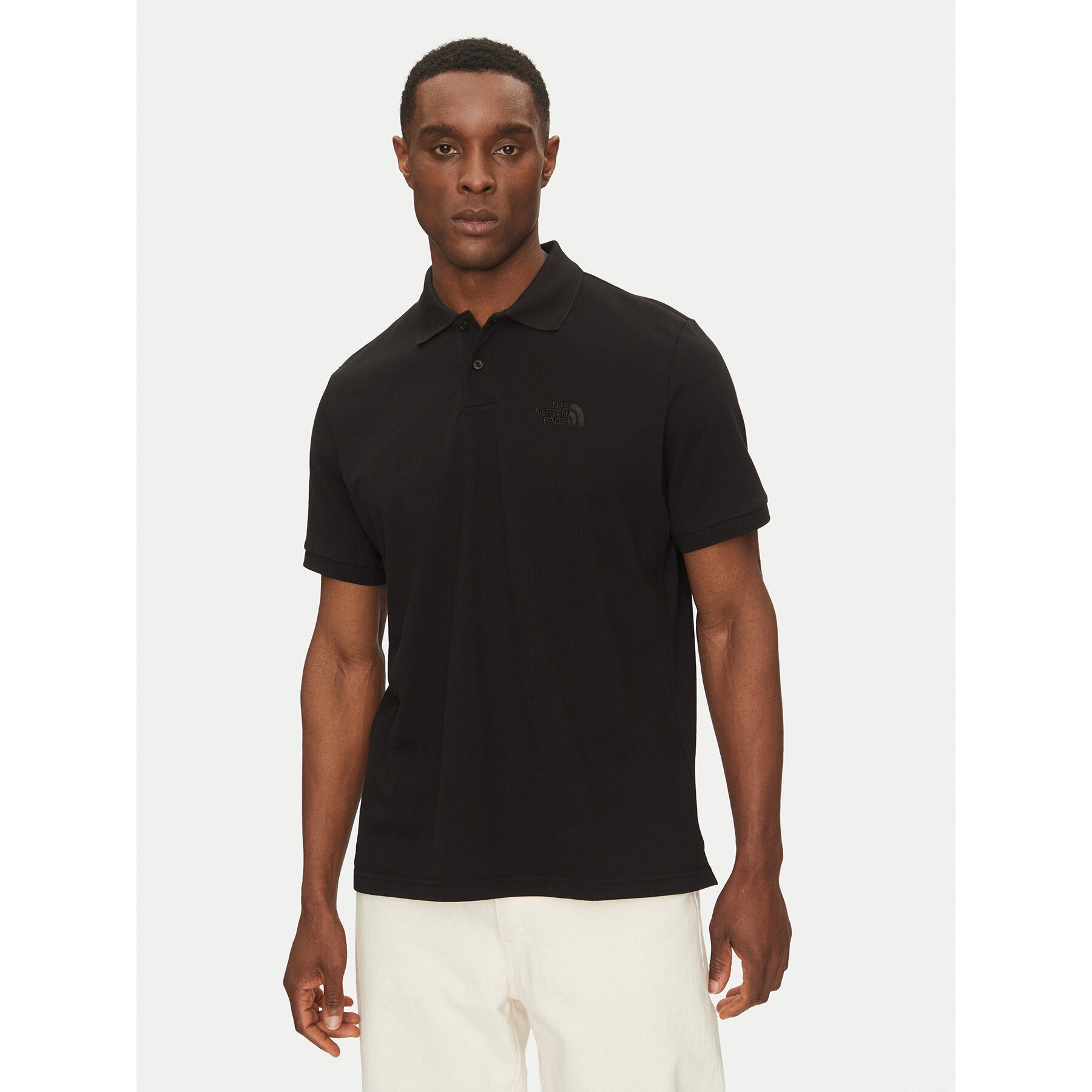 The North Face Polo marškinėliai Essential NF0A8C1P Juoda Regular Fit