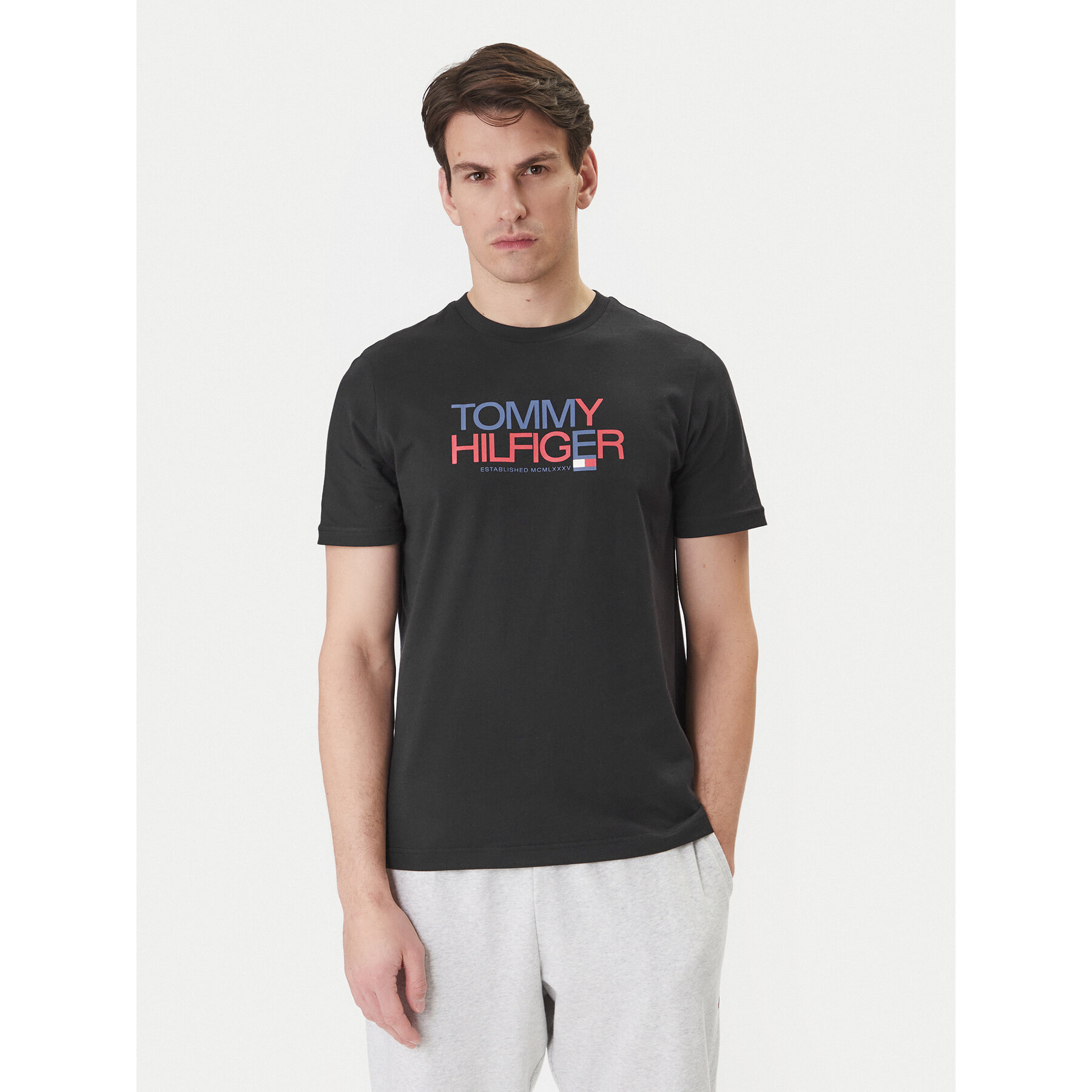 Tommy Hilfiger T-Shirt Brand Love Big Text MW0MW42369 Schwarz Regular Fit