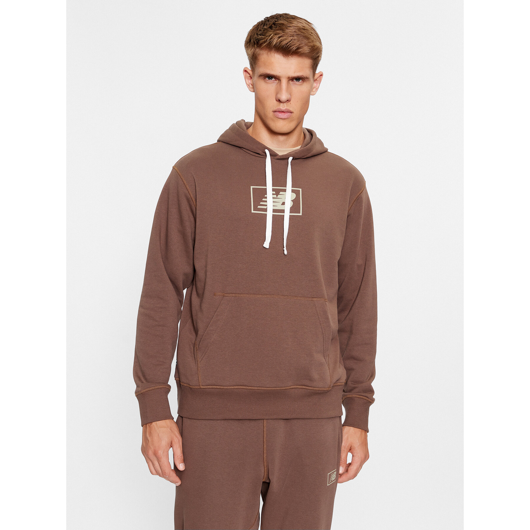 New Balance Sweatshirt NB Essentials Hoodie MT33508 Braun Regular Fit
