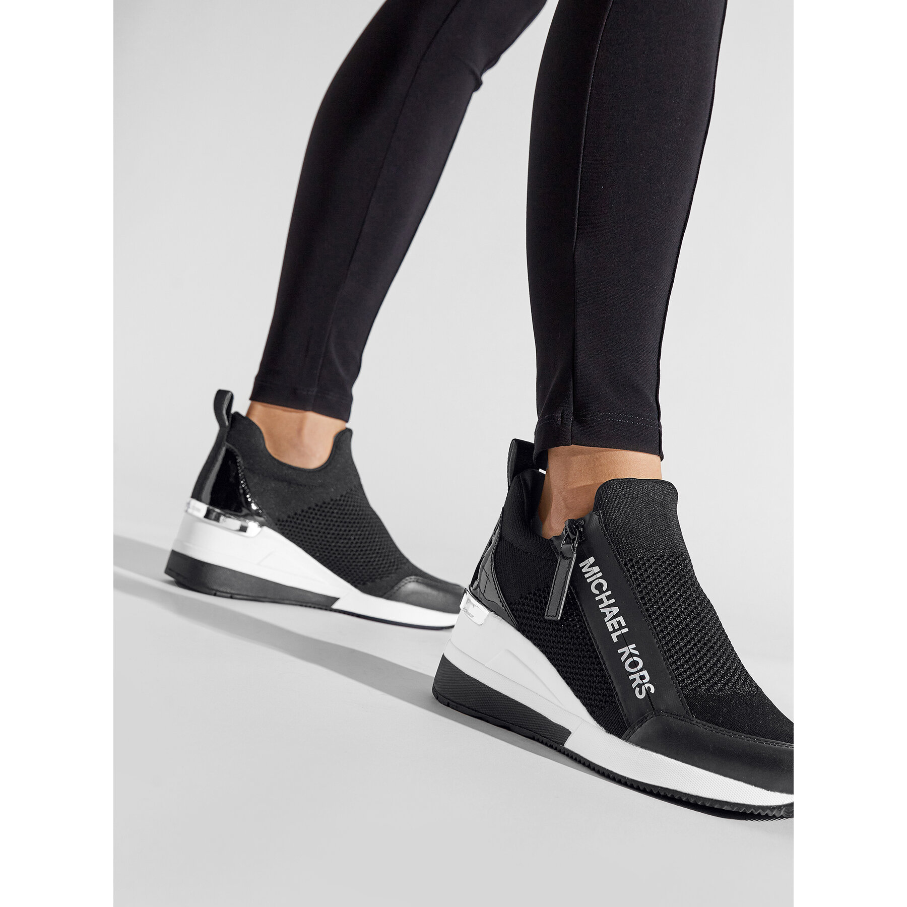 Superge MICHAEL Michael Kors Willis Wedge Trainer 43S2WIFS1D Črna