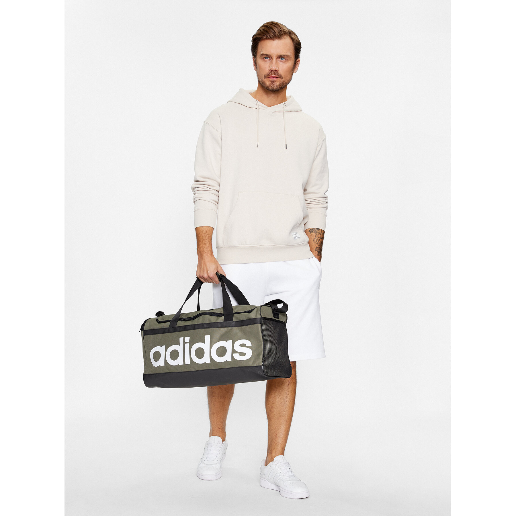 Sportska torba adidas Essentials Linear Duffel Bag Medium HR5350 Zelena
