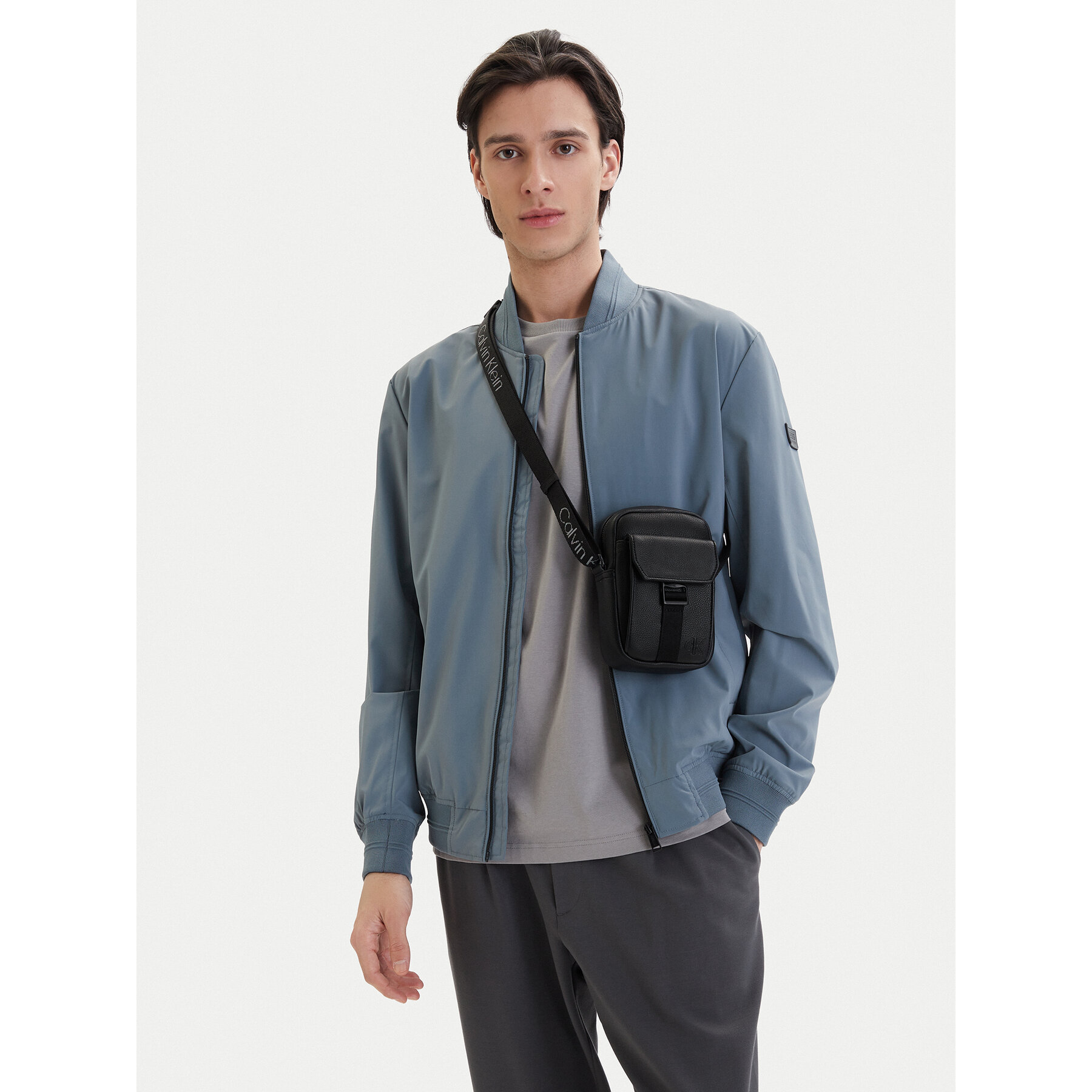 Geantă crossover Calvin Klein Webbing Strap Slim Reporter LV04D3281G Negru