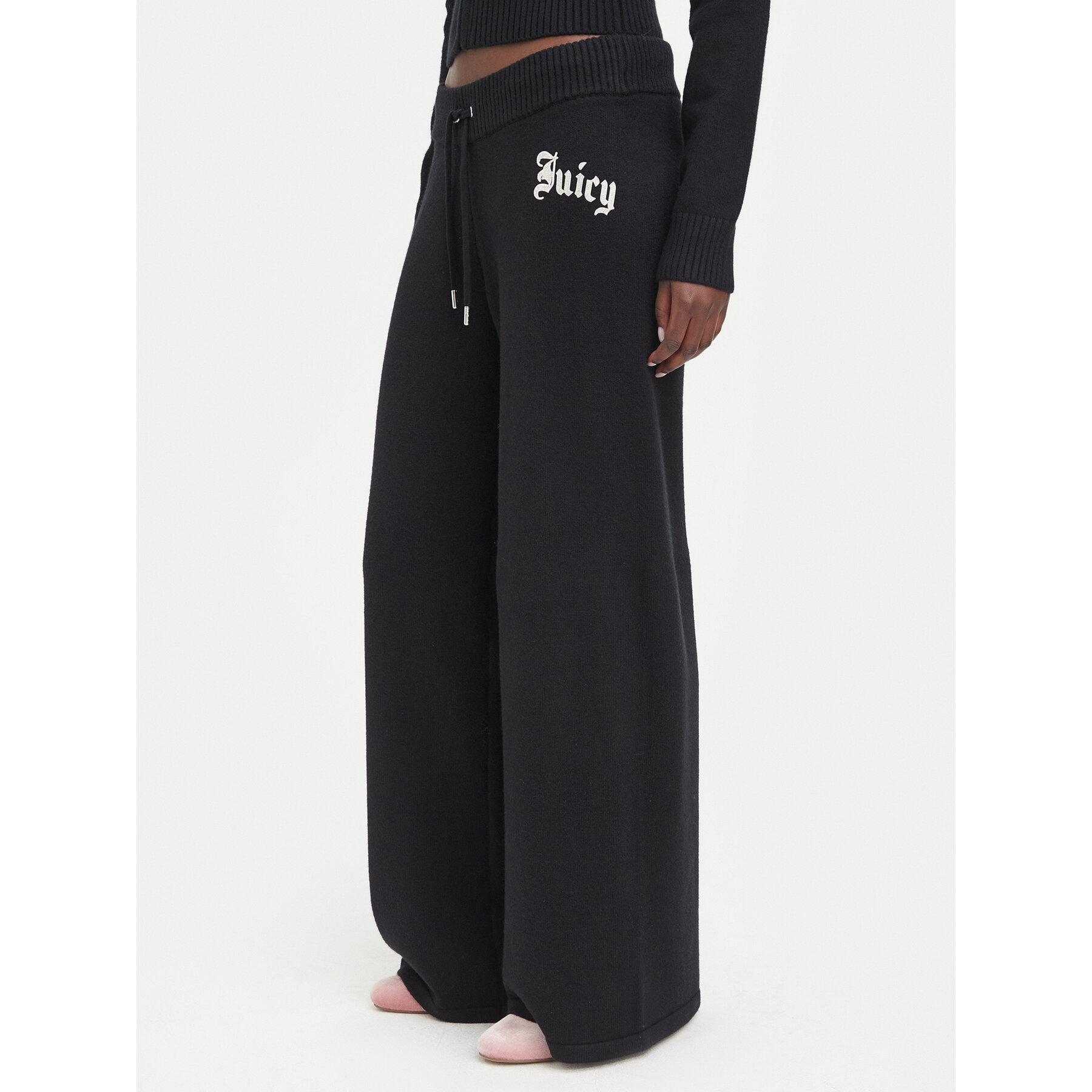 Juicy Couture Pletene hlače JCWBJ226310 Crna Relaxed Fit