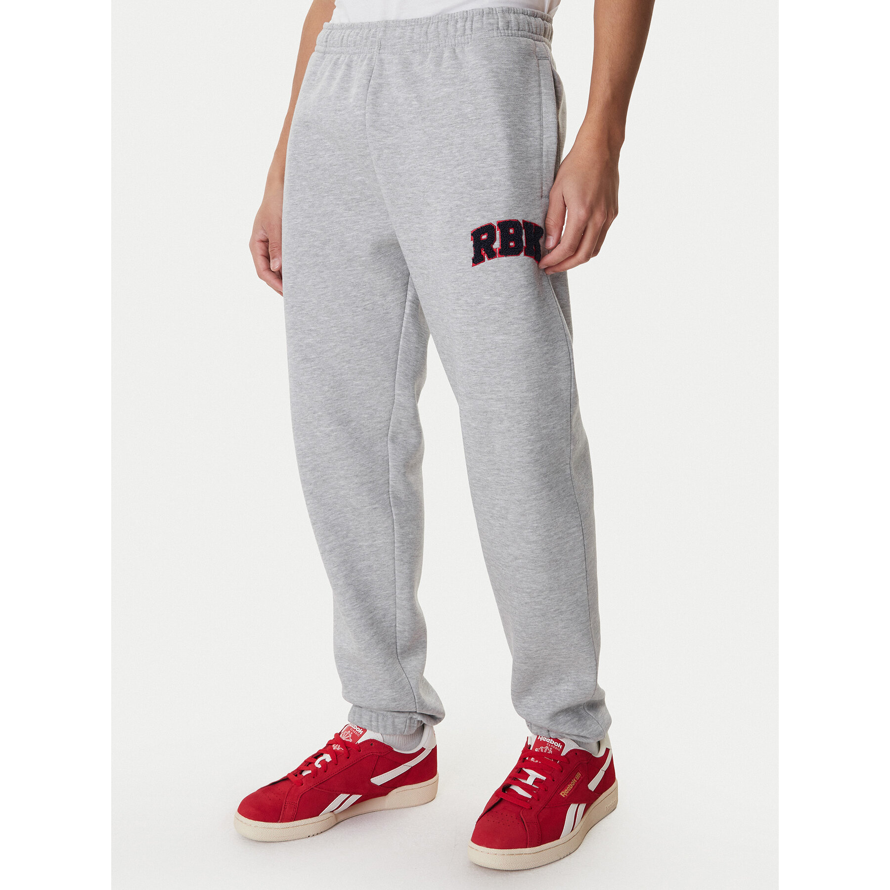 Reebok Donji dio trenerke Bermingham RK25555CCM Siva Relaxed Fit