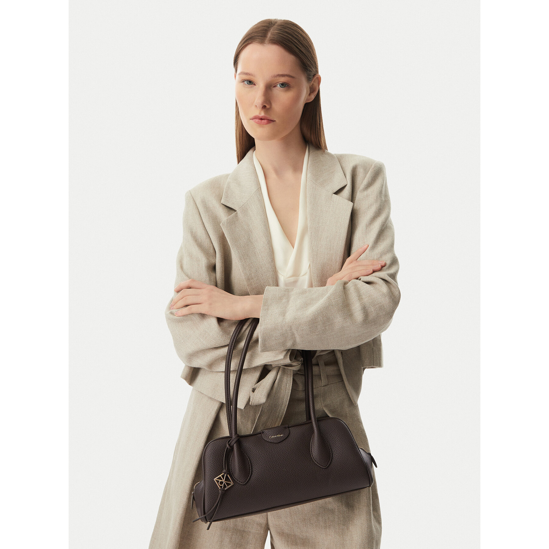 Geantă Calvin Klein Emblem Trio Pebble LV04F3743G Maro