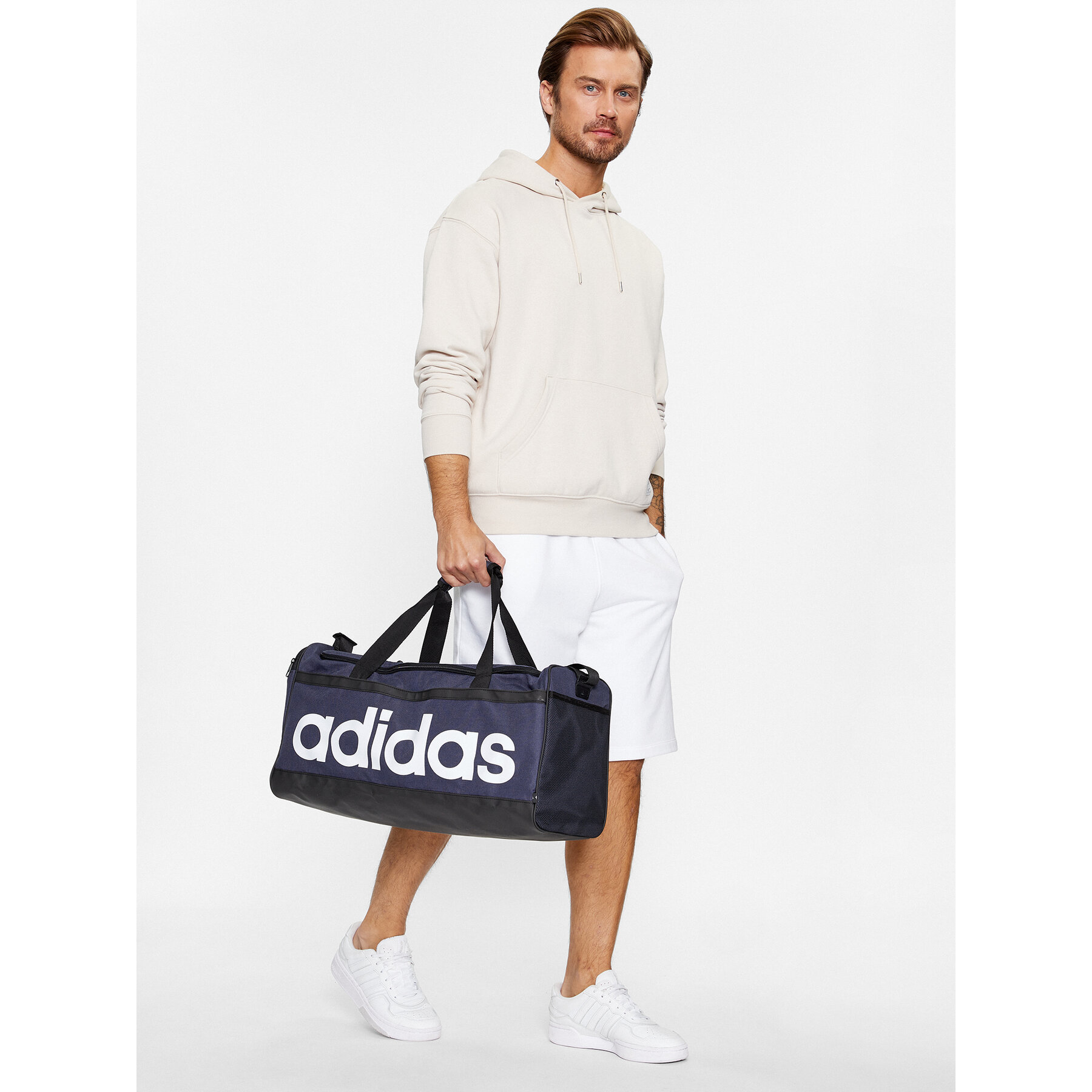 Sporttáska adidas Essentials Linear Duffel Medium HR5349 Sötétkék