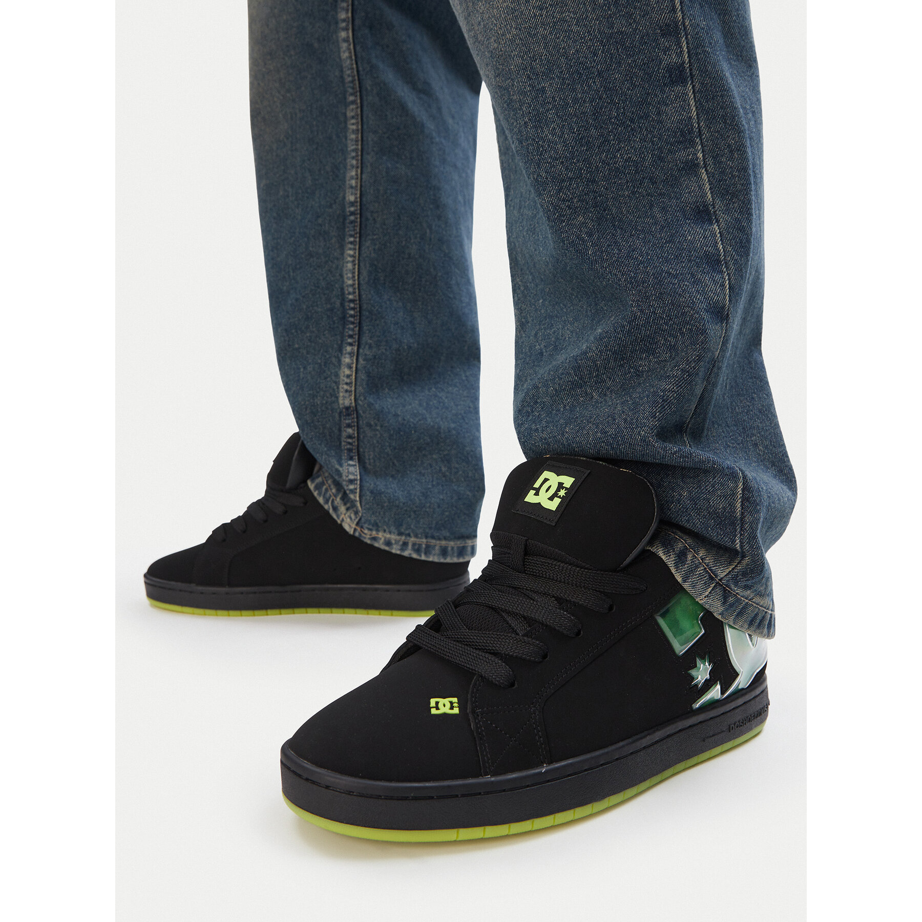 Sneakersy DC Shoes EO-COURT GRAFFIK JUMANJI DC06528001 Čierna