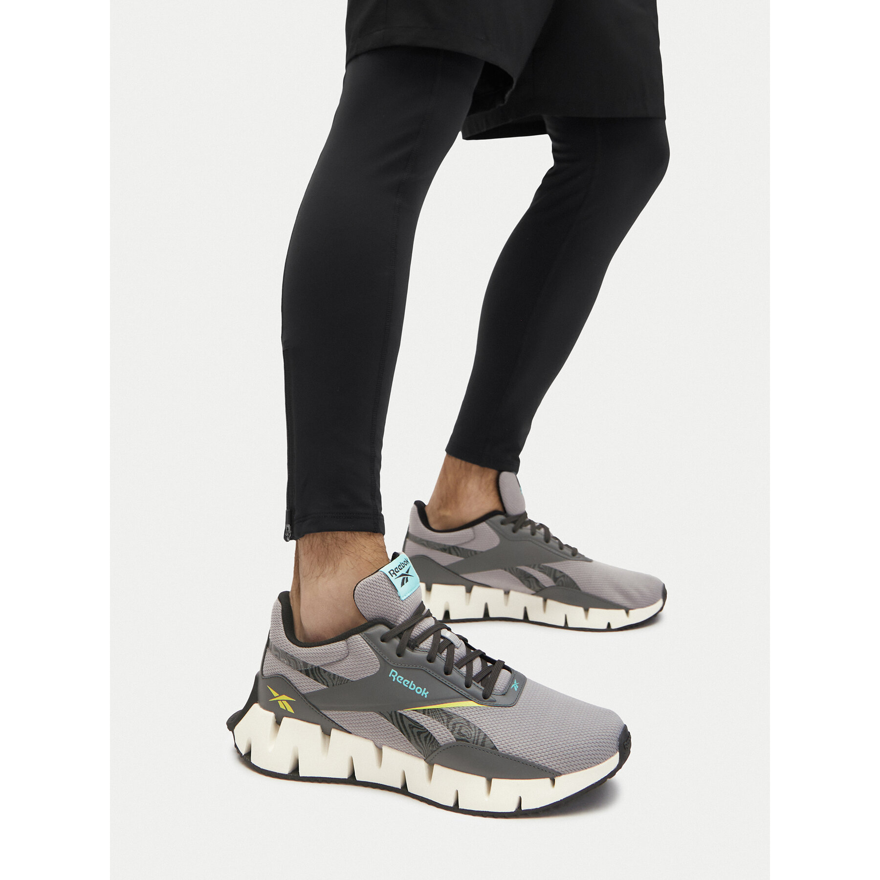 Bežecké topánky Reebok ZIG DYNAMICA STR 100209976 Sivá