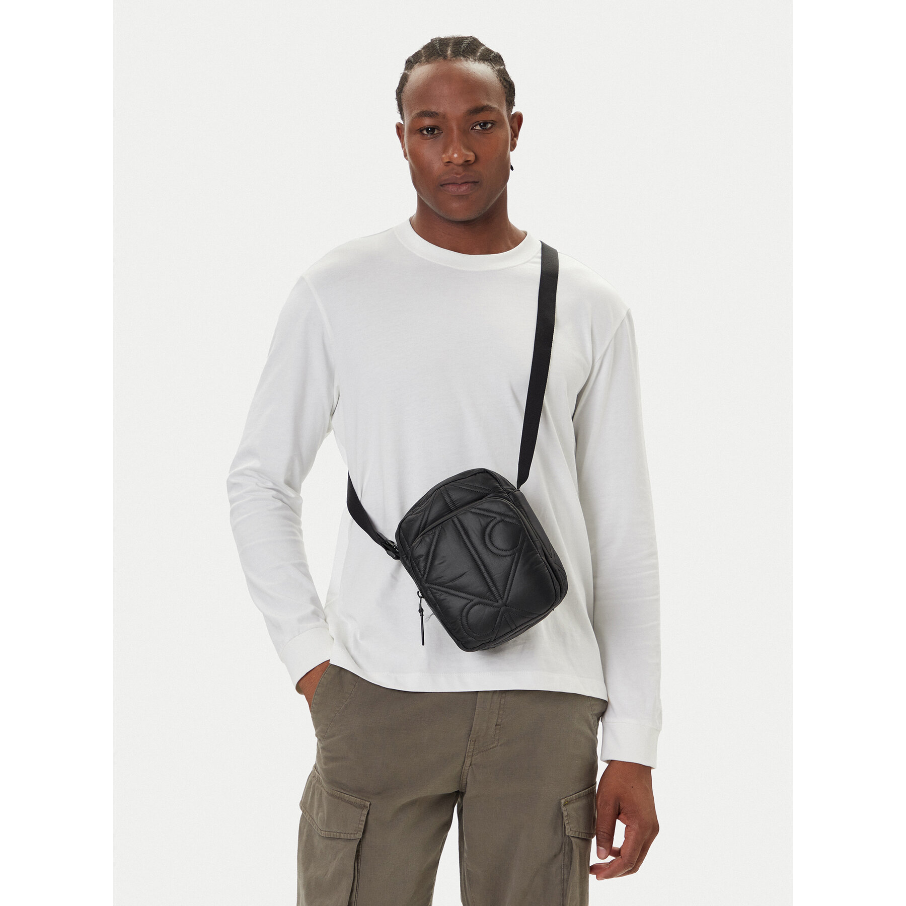 Torbica za okrog pasu﻿ Calvin Klein Puffer Reporter LV04D3164G Črna