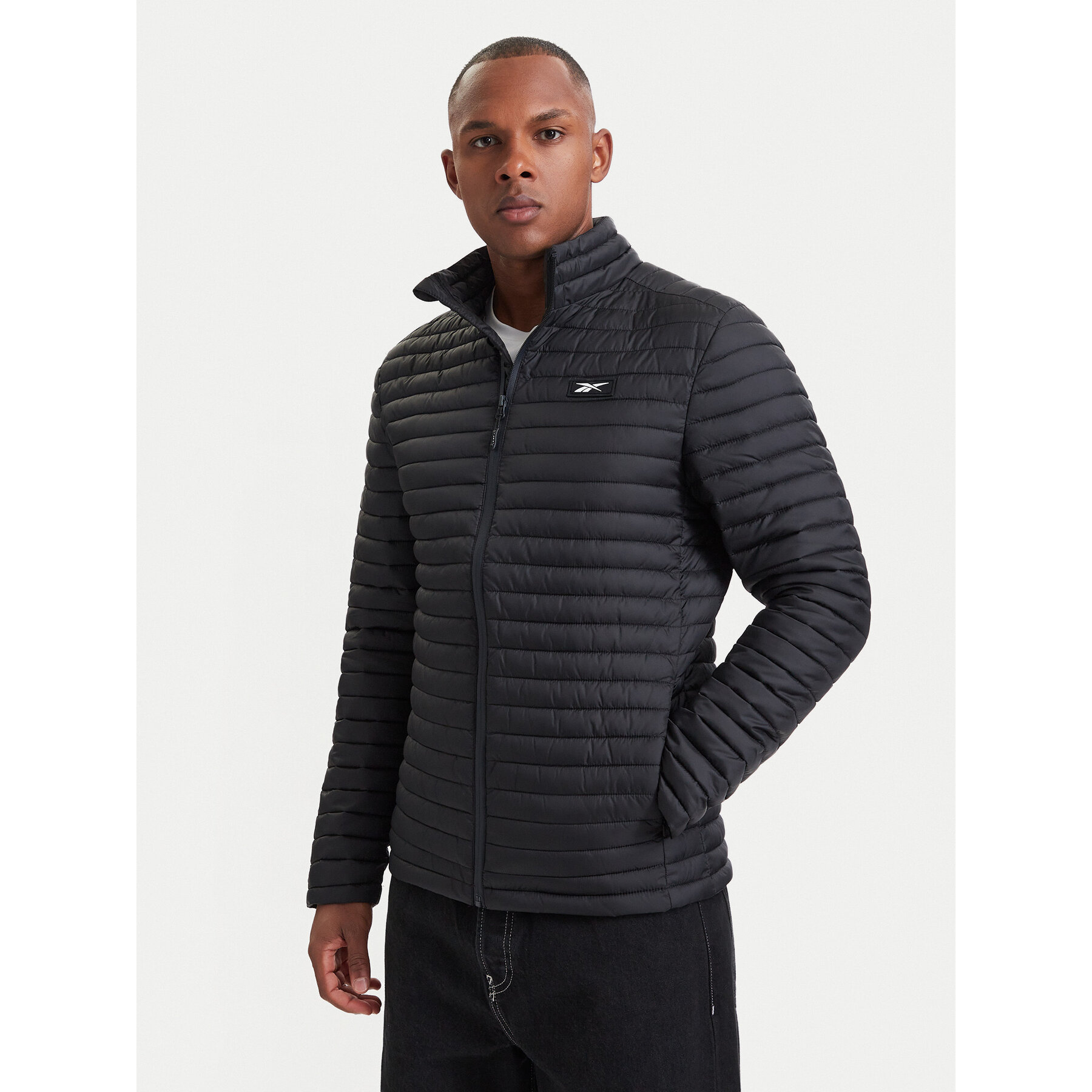 Reebok Prijelazna jakna RCC00085 Crna Regular Fit