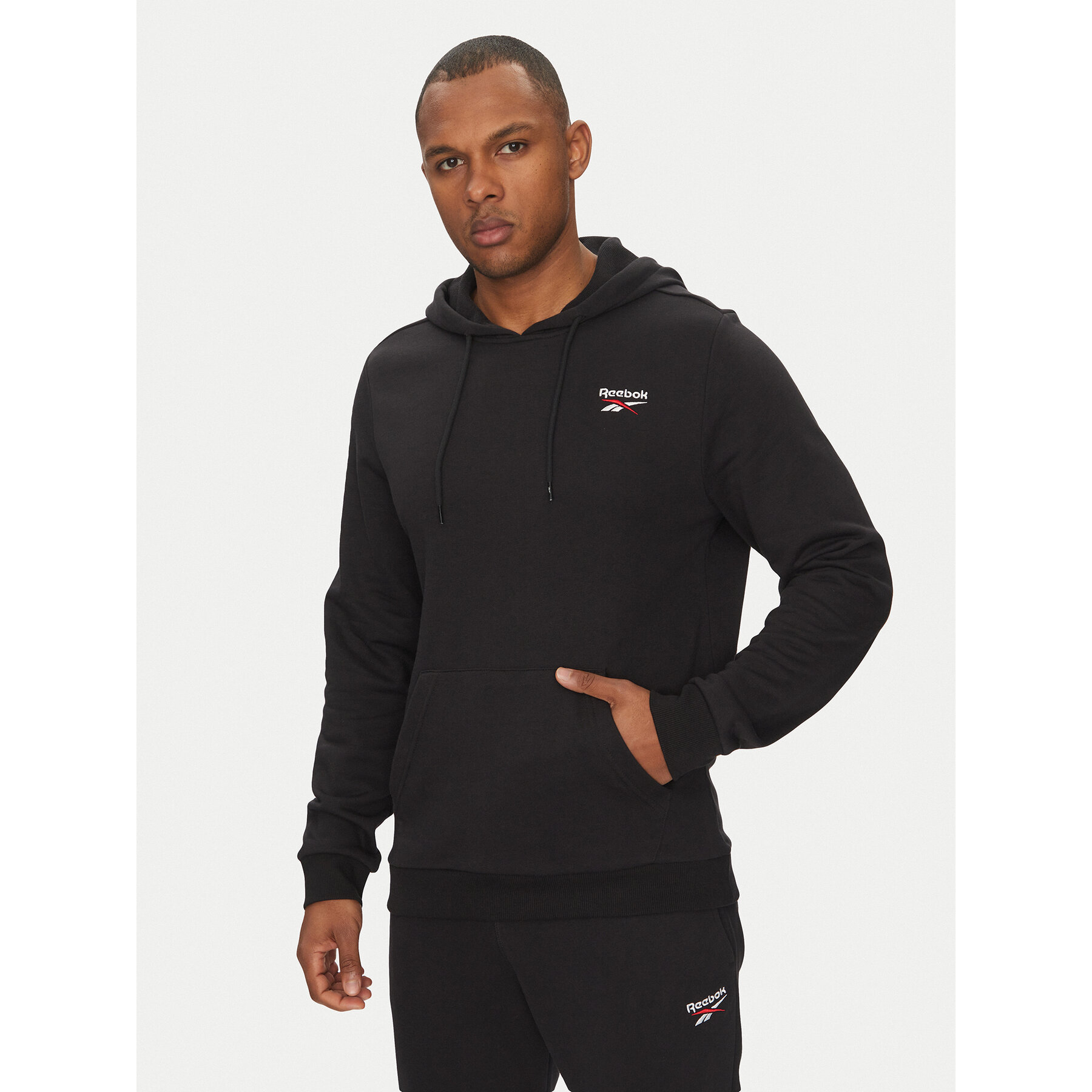 Reebok Majica dugih rukava Identhlty Small Logo 100221784 Crna Regular Fit