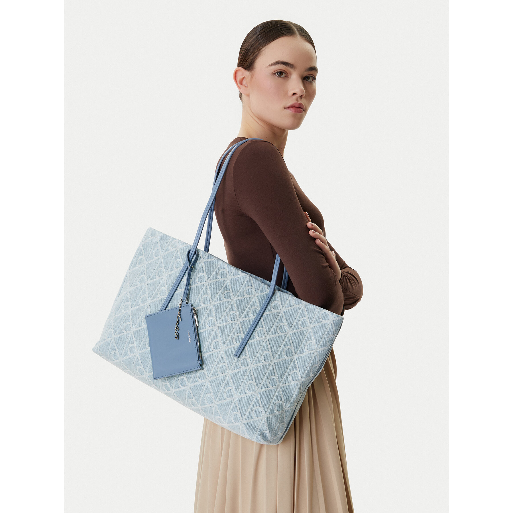 Geantă Calvin Klein Emblem Aop Denim Tote W/ Pouch LV04F3428G Albastru