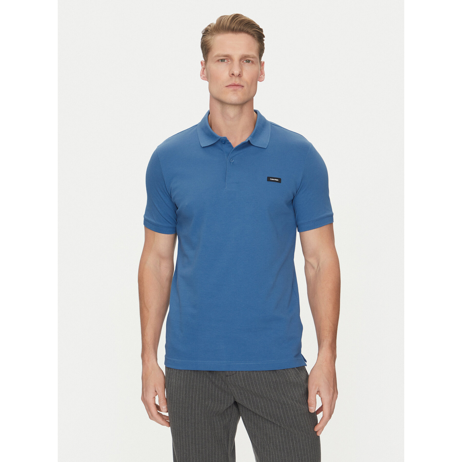 Calvin Klein Polo majica K10K111196 Modra Slim Fit