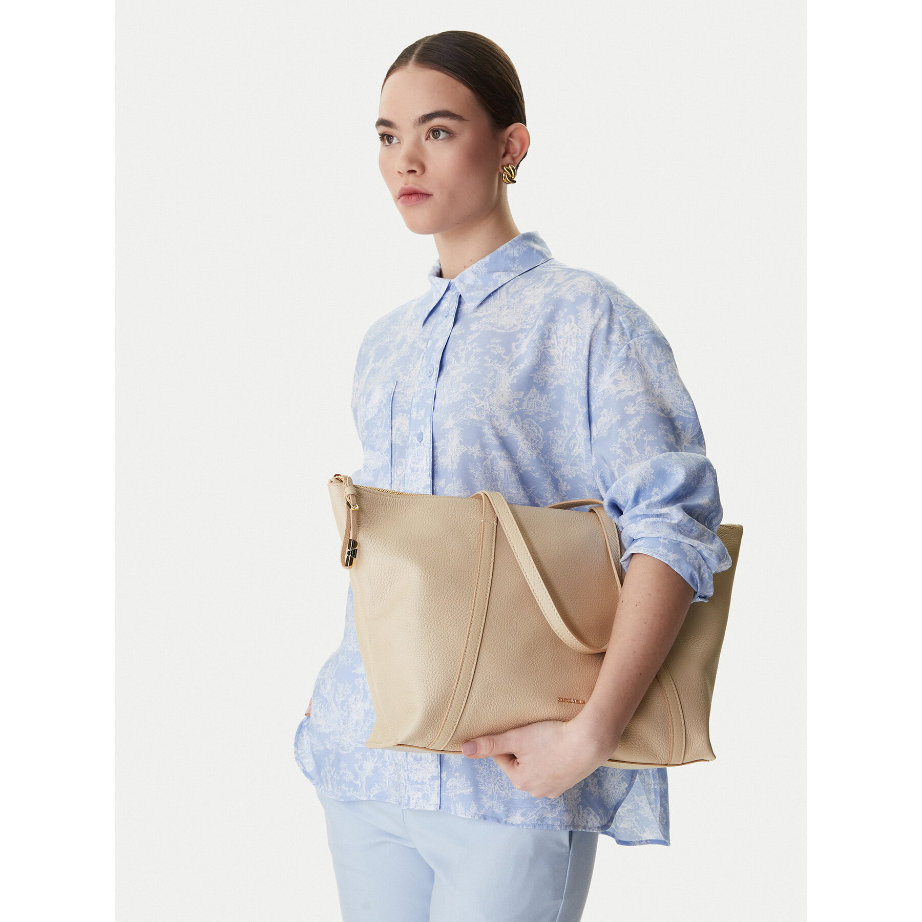 Geantă Coccinelle U45 Coccinelle Nory E1 U45 11 01 01 Bej