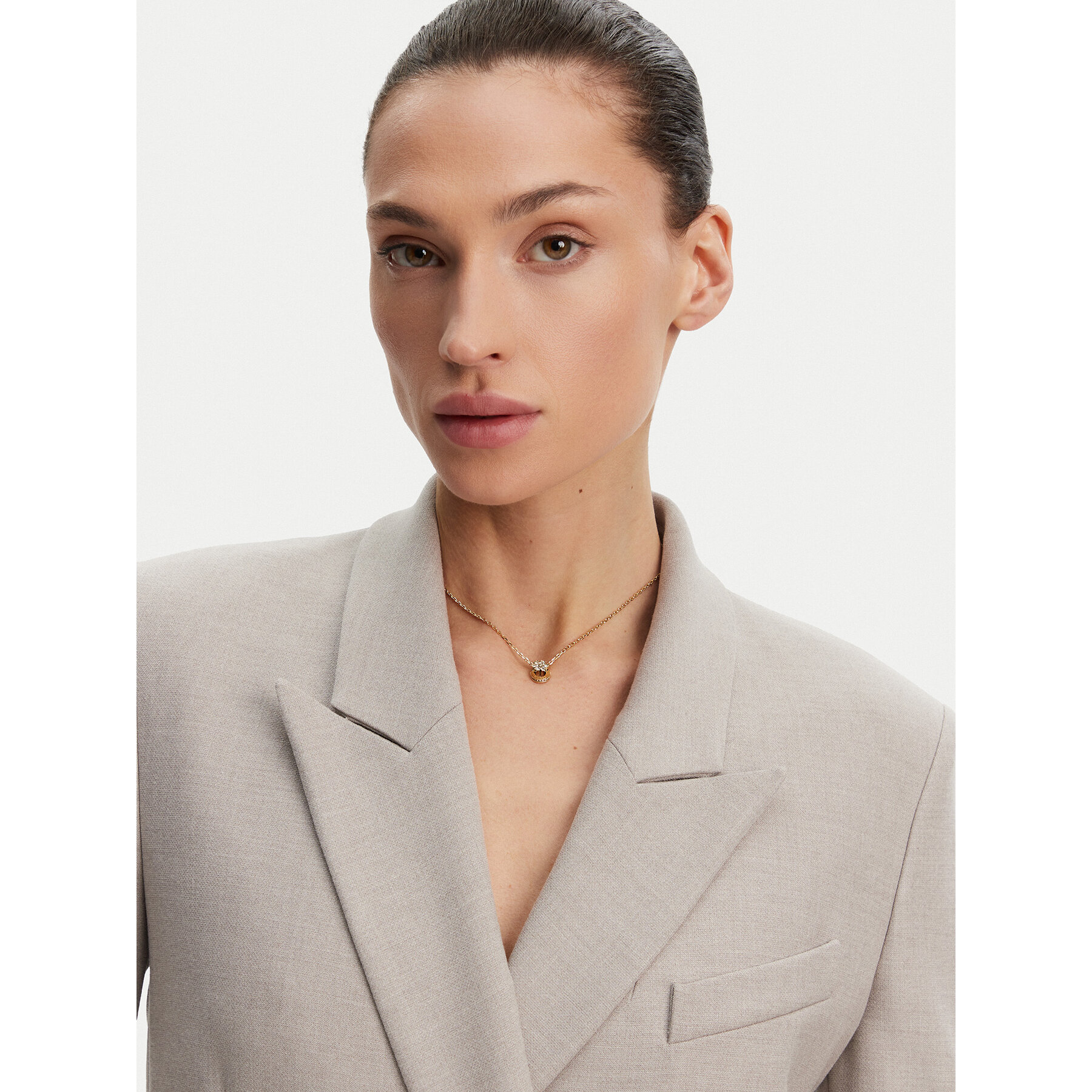 Ogrlica Guess JUBN05 107JW Zlatna