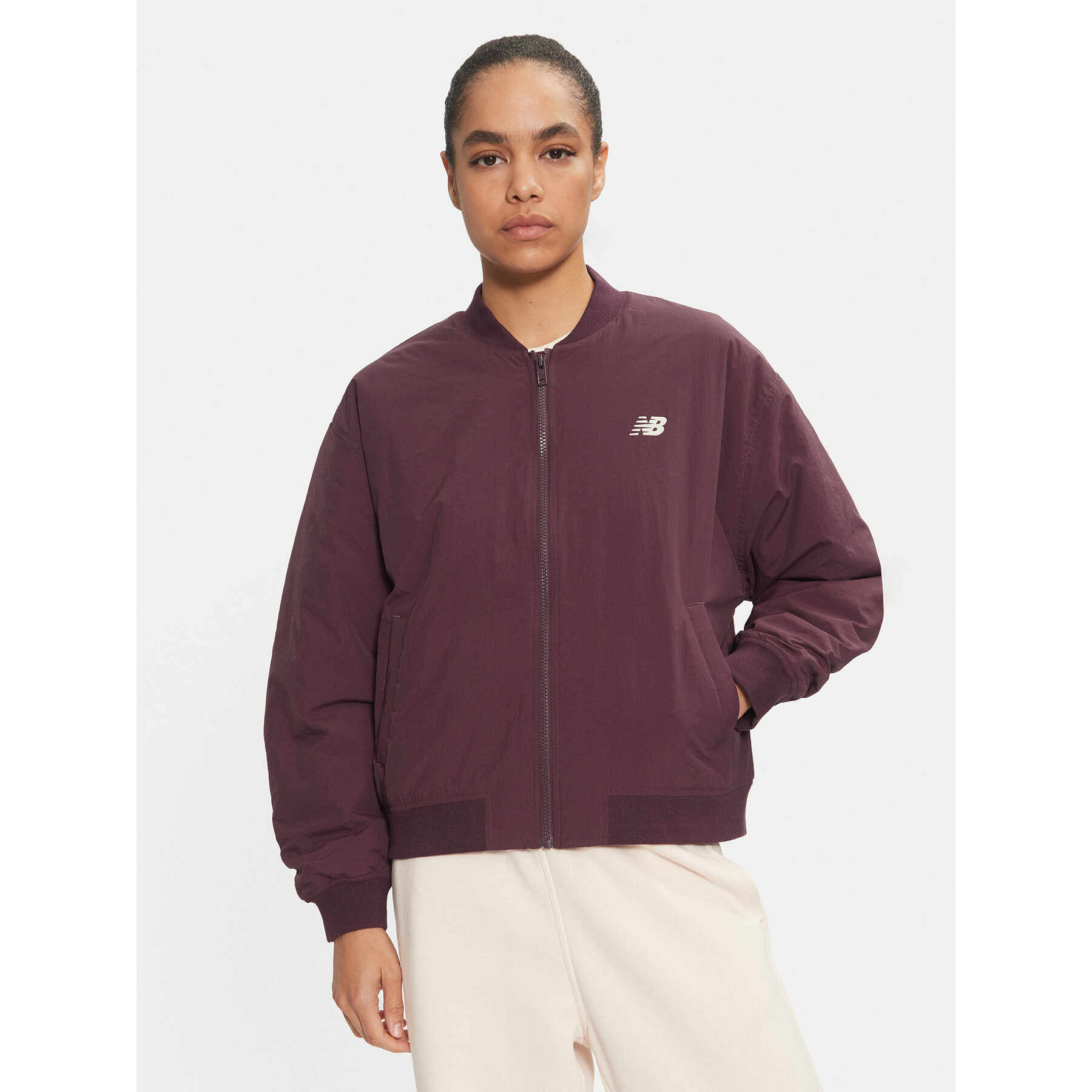 New Balance Bomberjacke WJ43511 Braun Regular Fit
