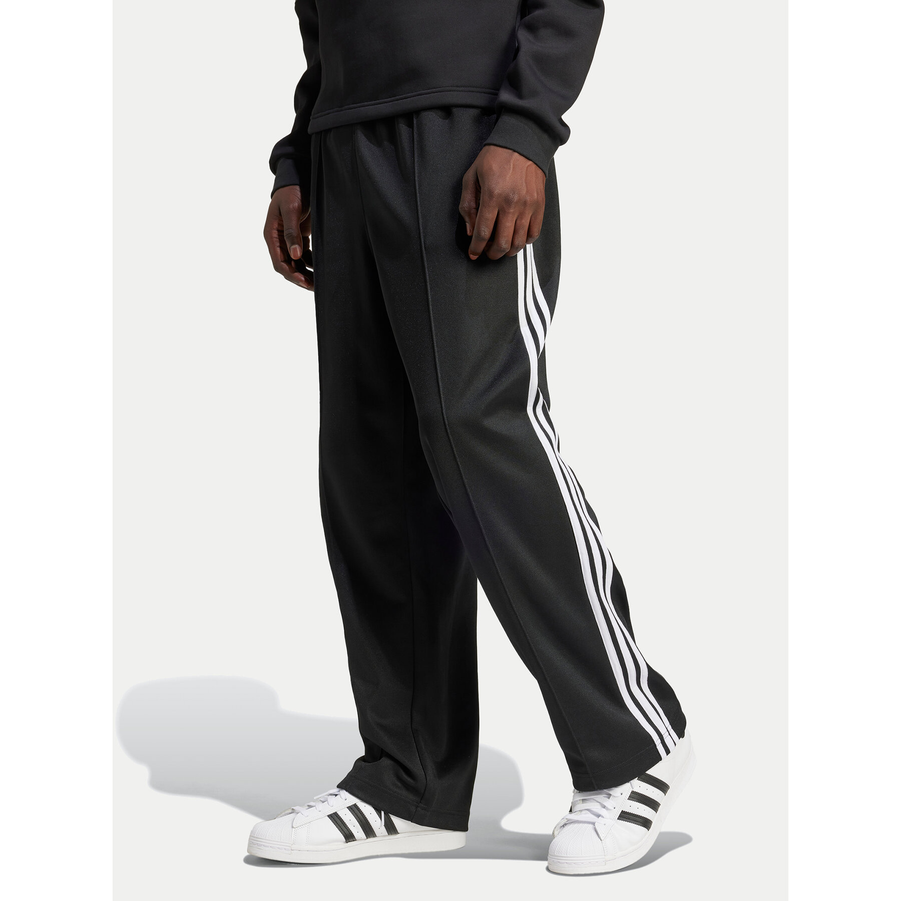 adidas Jogginghose adicolor Firebird IZ4801 Schwarz Baggy Fit