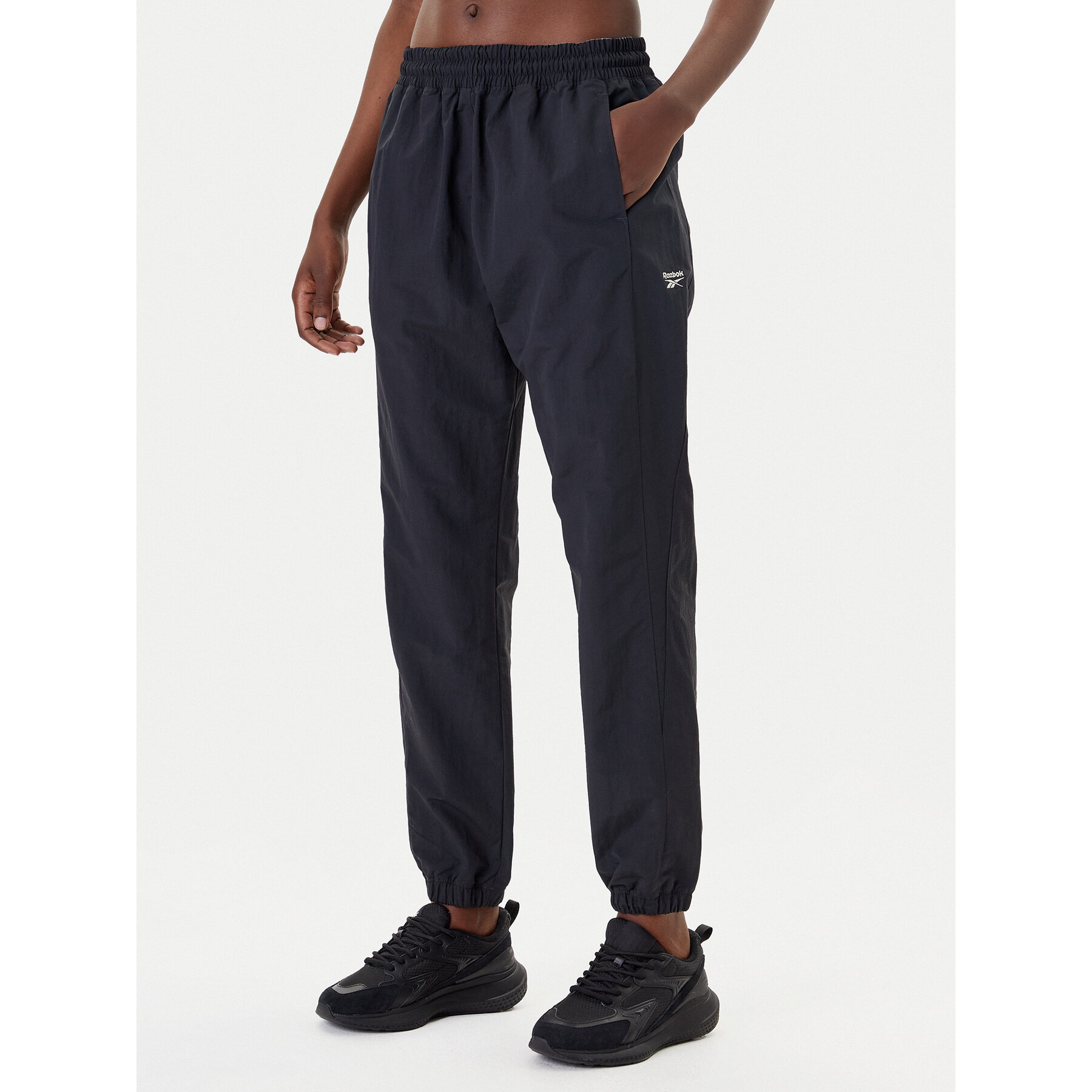 Reebok Παντελόνι φόρμας Vector 100221435 Μαύρο Relaxed Fit