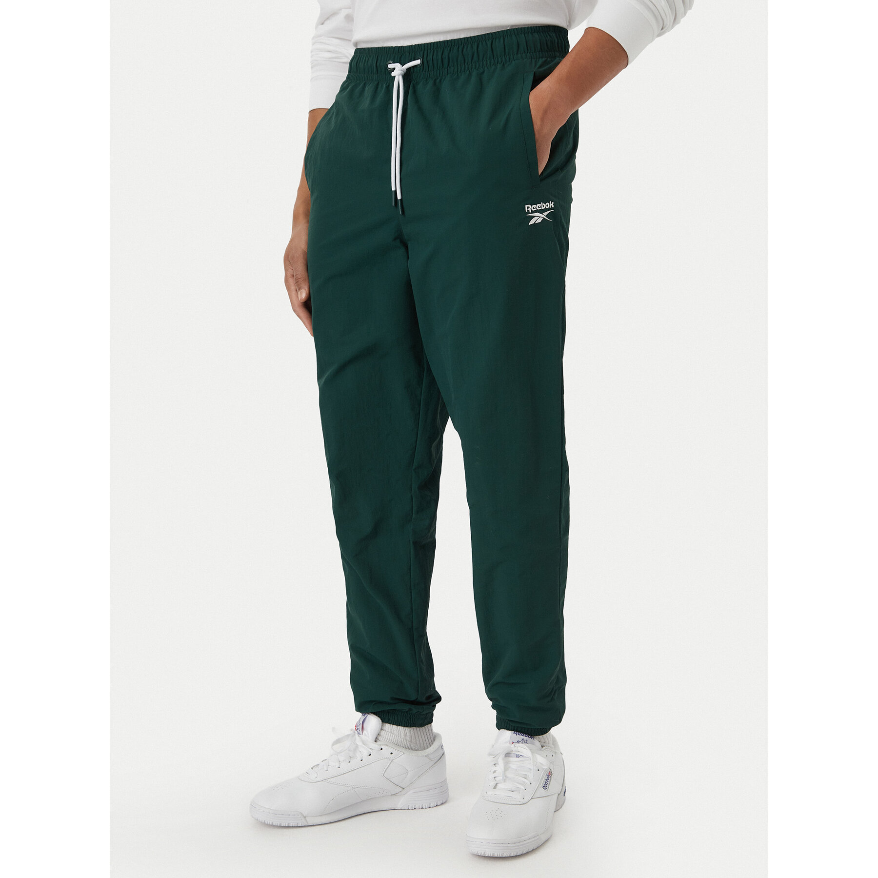 Reebok Donji dio trenerke Mieszko RK25722CCM Tamno zelena Regular Fit