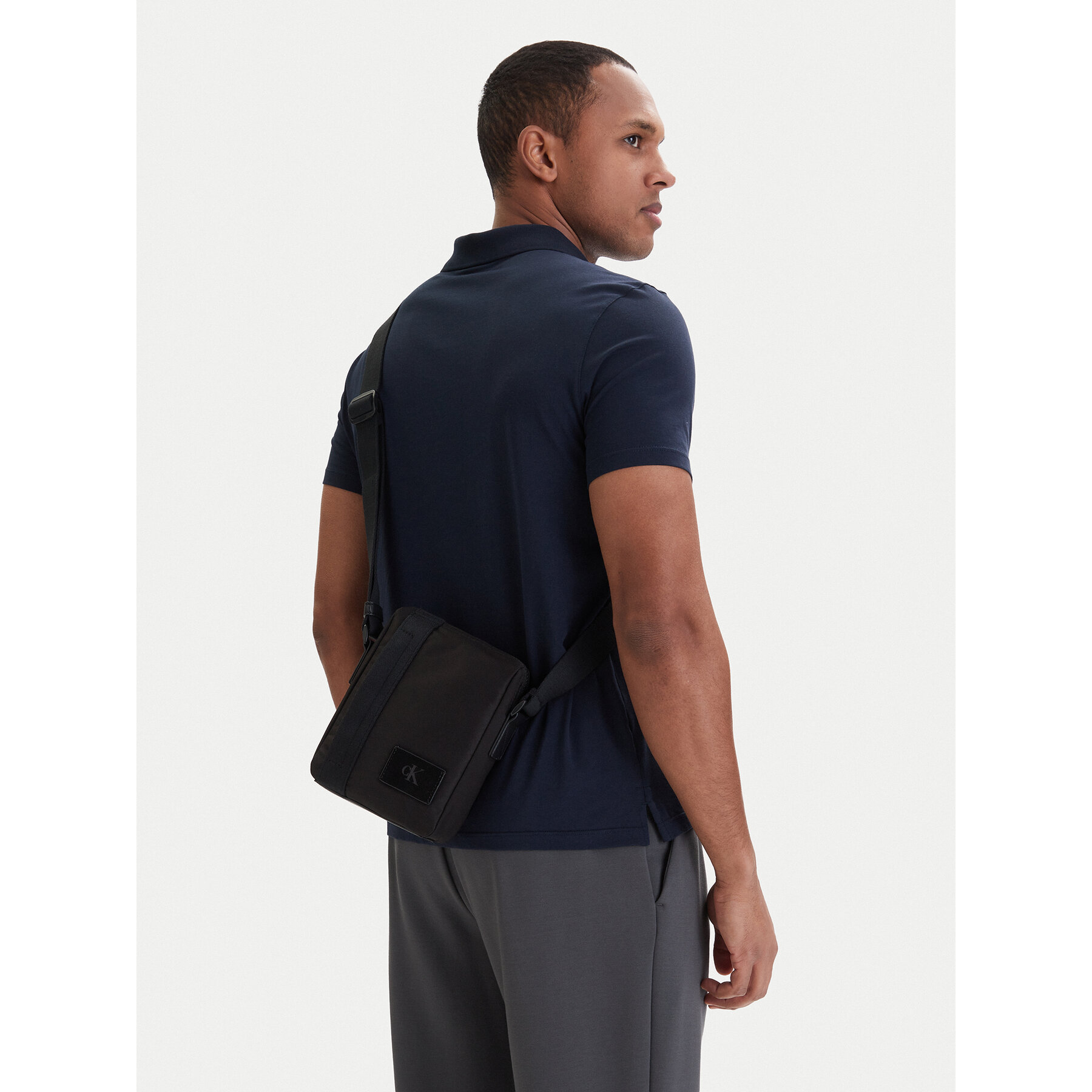 Geantă crossover Calvin Klein Canvas Mix Reporter LV04D3366G Negru