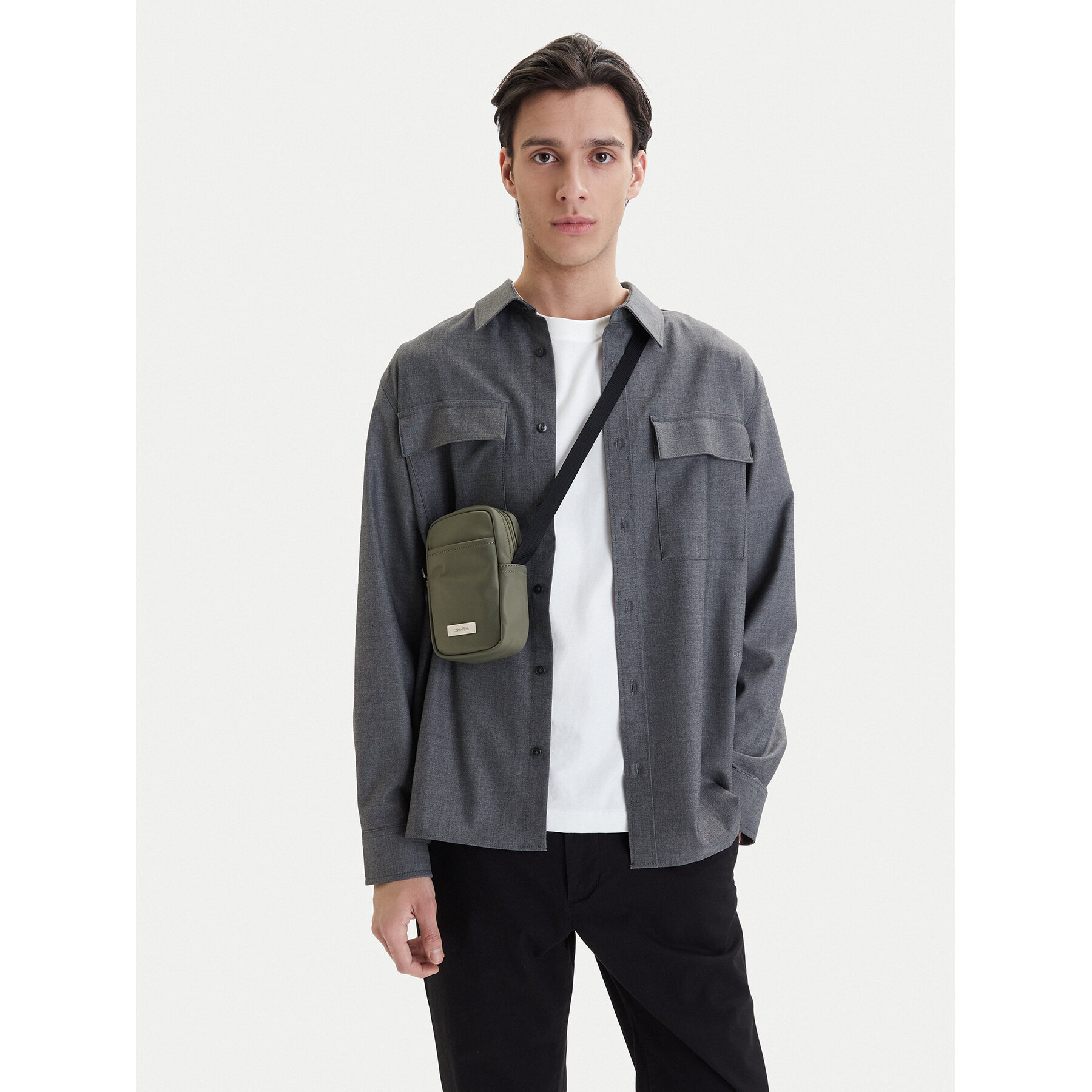 Crossover torbica Calvin Klein Sleek Slim Reporter LV04D3233G Zelena
