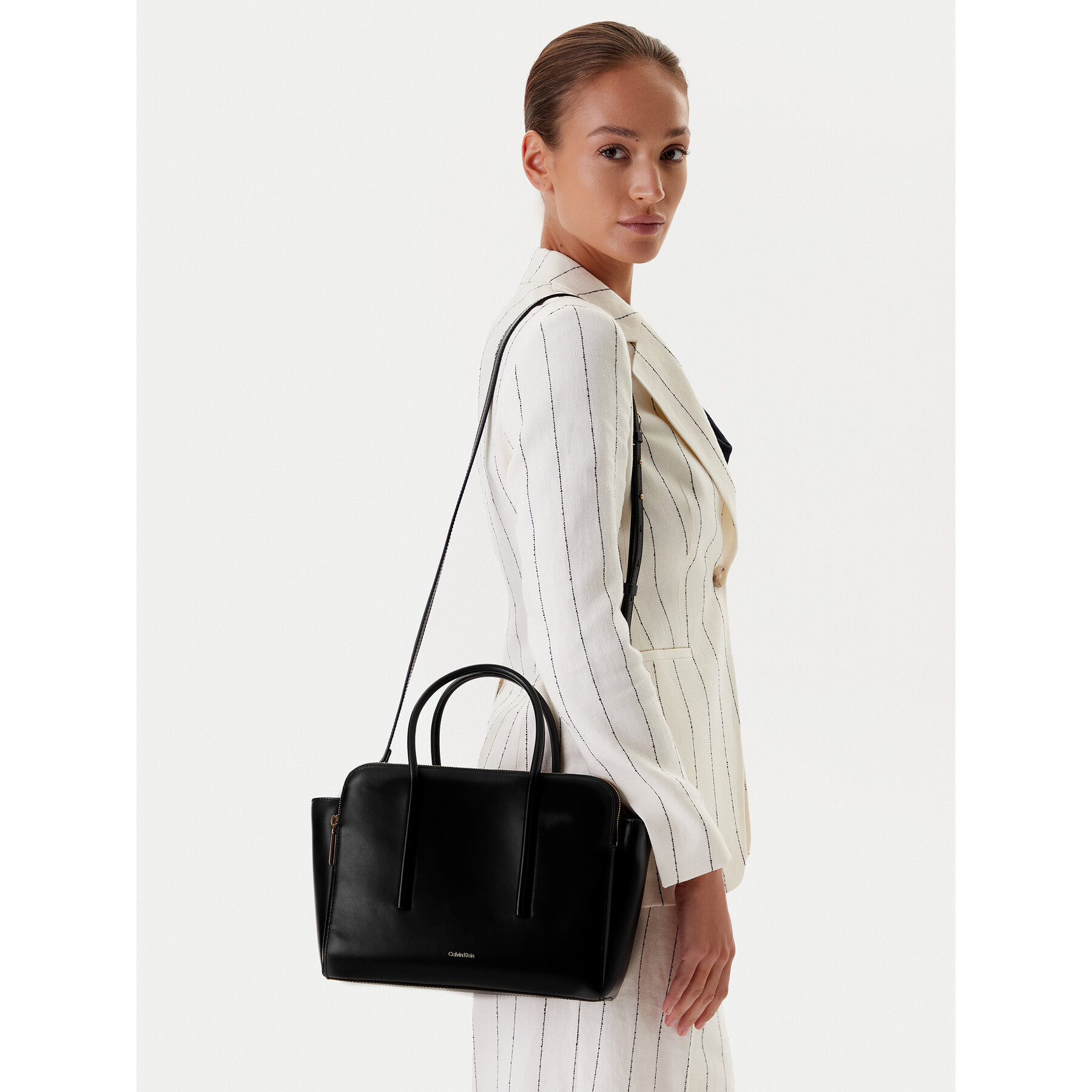 Torbica Calvin Klein Carryall Mini Leather Tote Bag LV04F3034G Crna