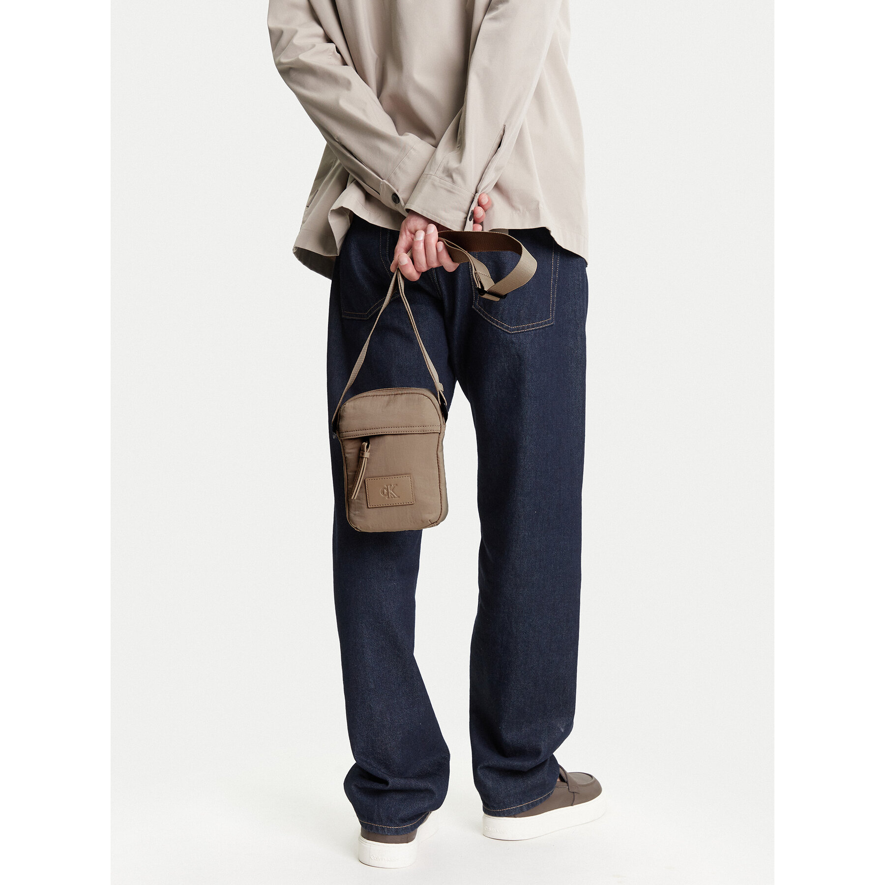 Torbica za okrog pasu Calvin Klein Jeans Metro Nylon Reporter S Ny LV04G3089G Bež
