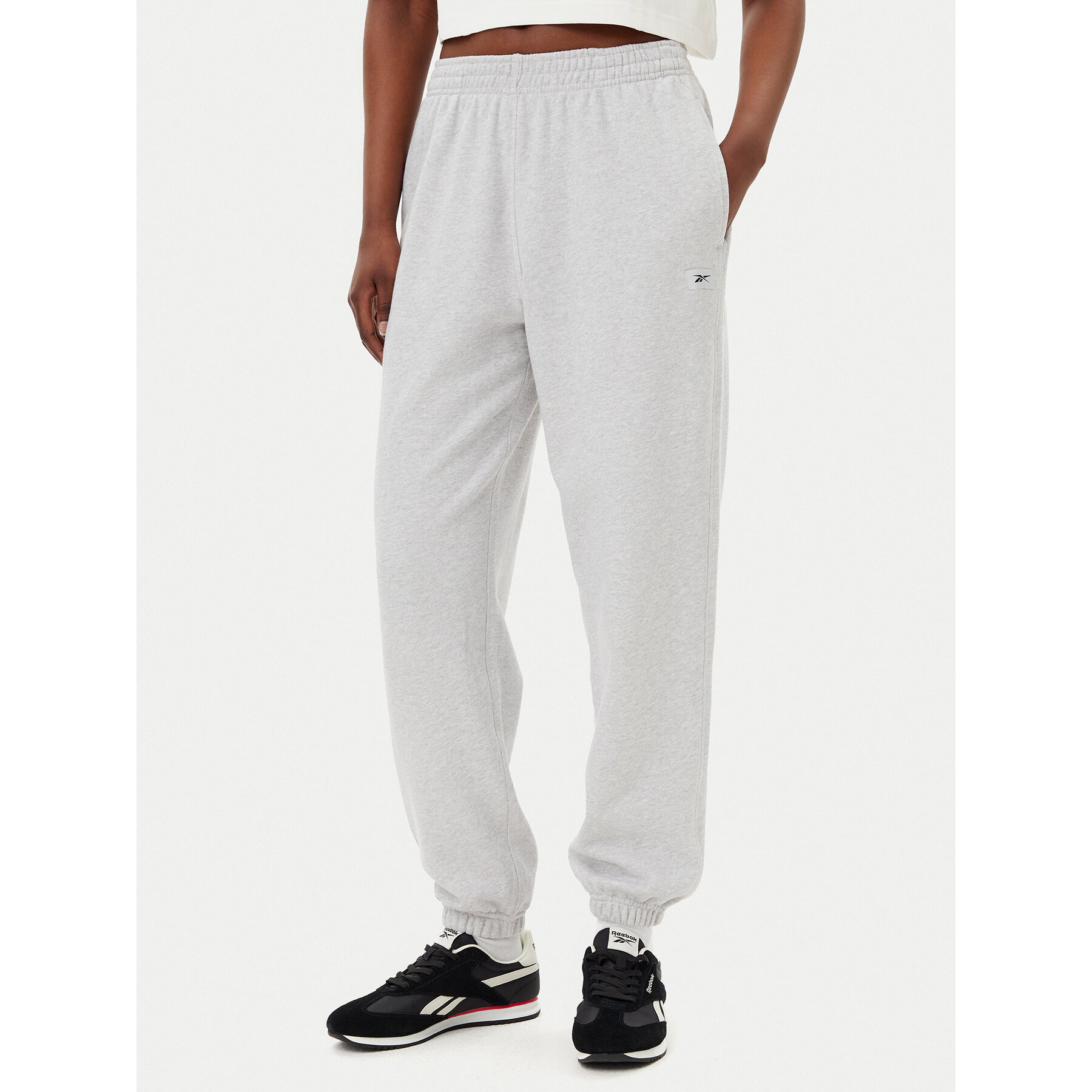 Reebok Donji dio trenerke 100221467 Siva Regular Fit