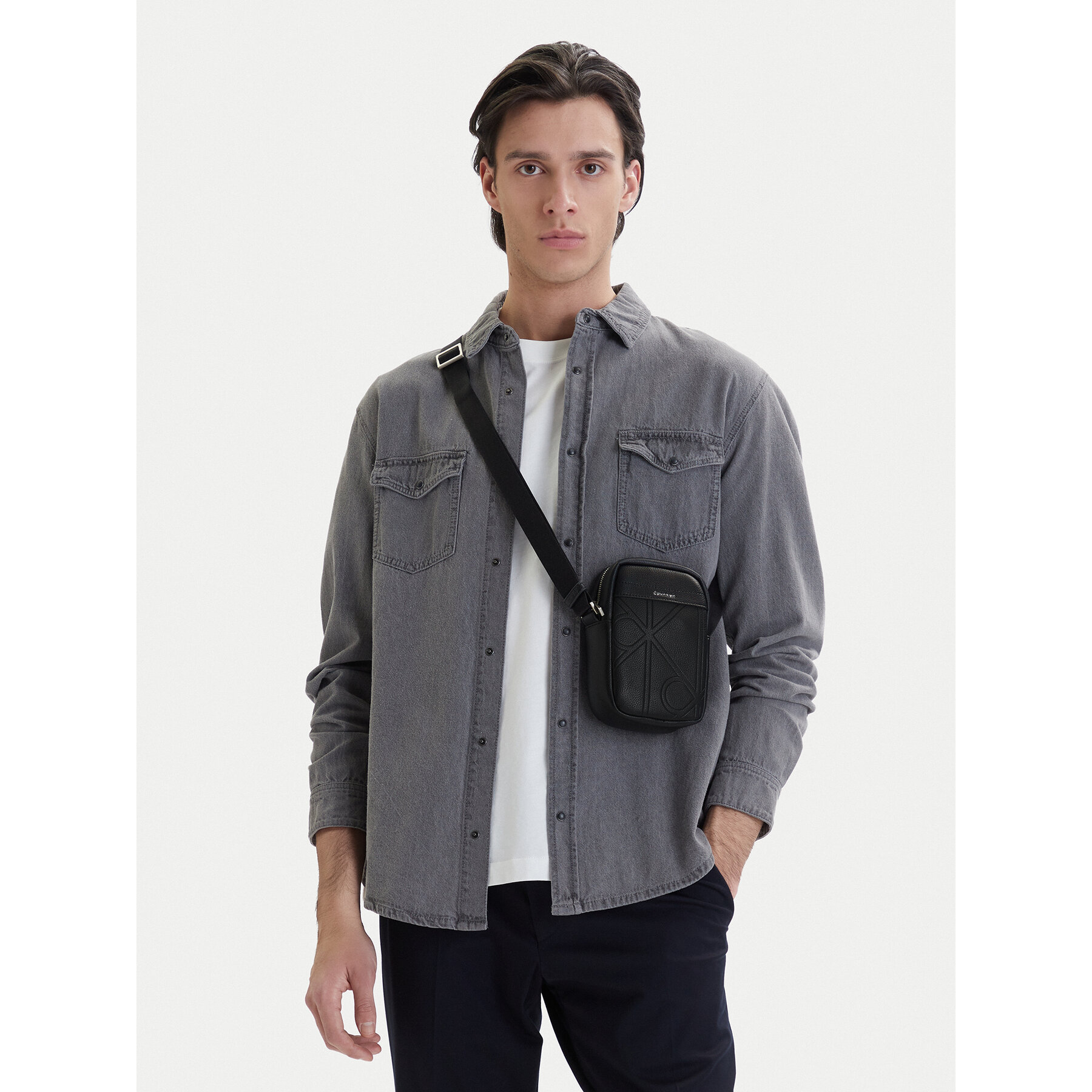 Geantă crossover Calvin Klein Emblem Aop Emboss Slim Reporter LV04D3371G Negru
