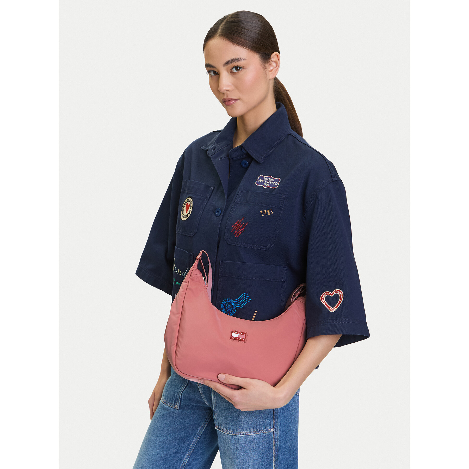 Ročna torba Tommy Jeans Urban X-Body AW0AW17547 Roza