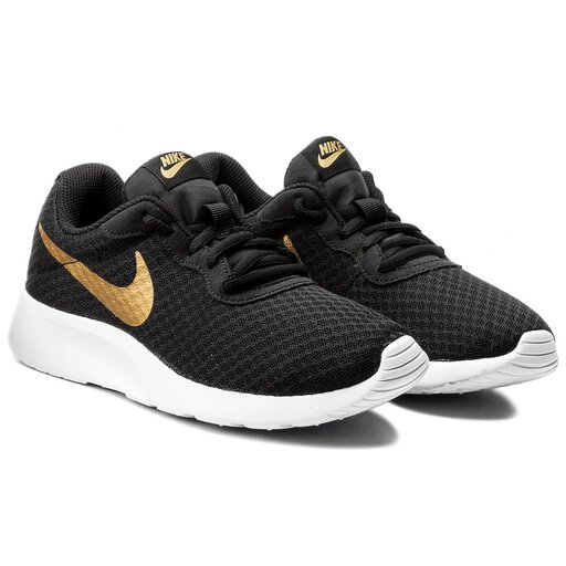 Nike tanjun damen schwarz gold discount