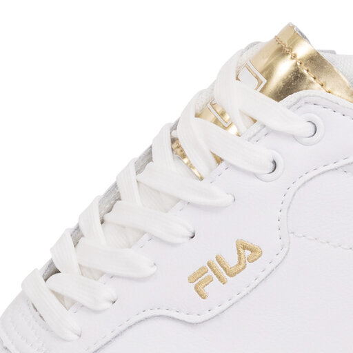 White and gold fila shoes top
