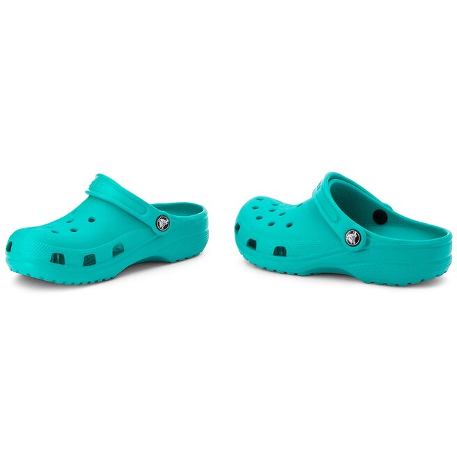Teal crocs shop