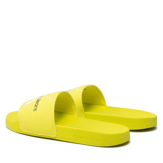 Calvin Klein Jeans Sandaler och Slip-ons Calvin Klein Jeans Slide Monogram Co YW0YW00103 Lemon Lime LRE