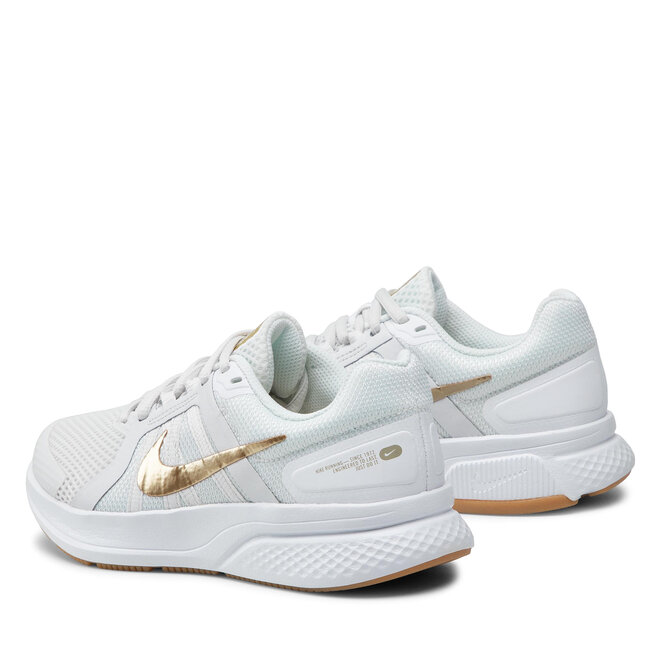 Nike Cipő Nike Run Swift 2 CU3528 010 Platinum Tint/Mtlx Gold Star