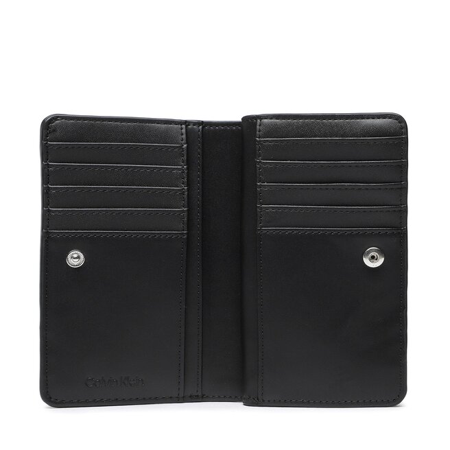 Calvin Klein Portafoglio grande da donna Calvin Klein Re Lock Bifold Wallet Emb Mono K60K610240 BAX