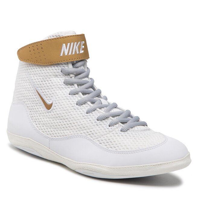 white and gold nike inflicts