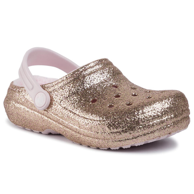 gold crocs with pink fur