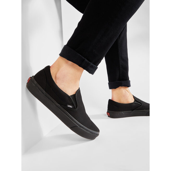 black slip on vans all black