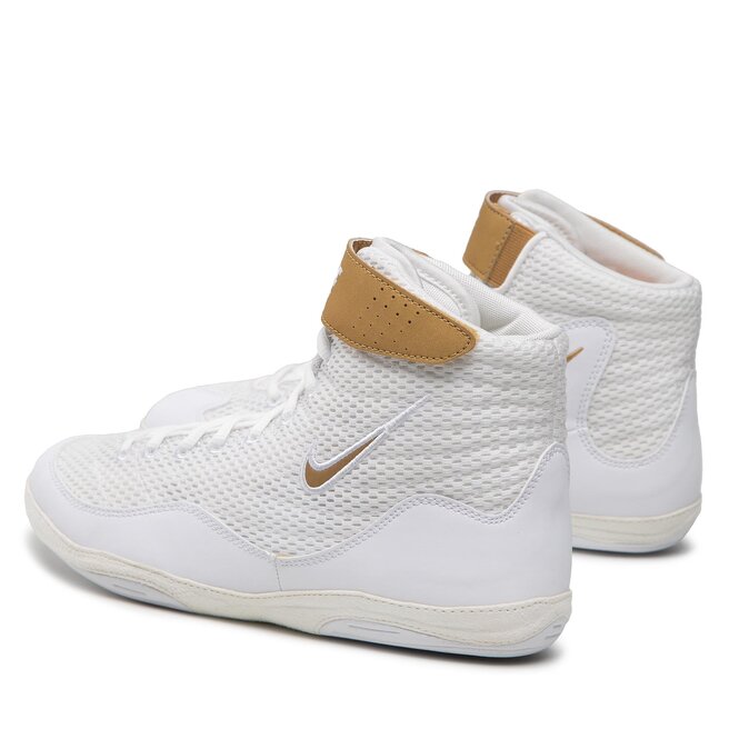 white and gold nike inflicts
