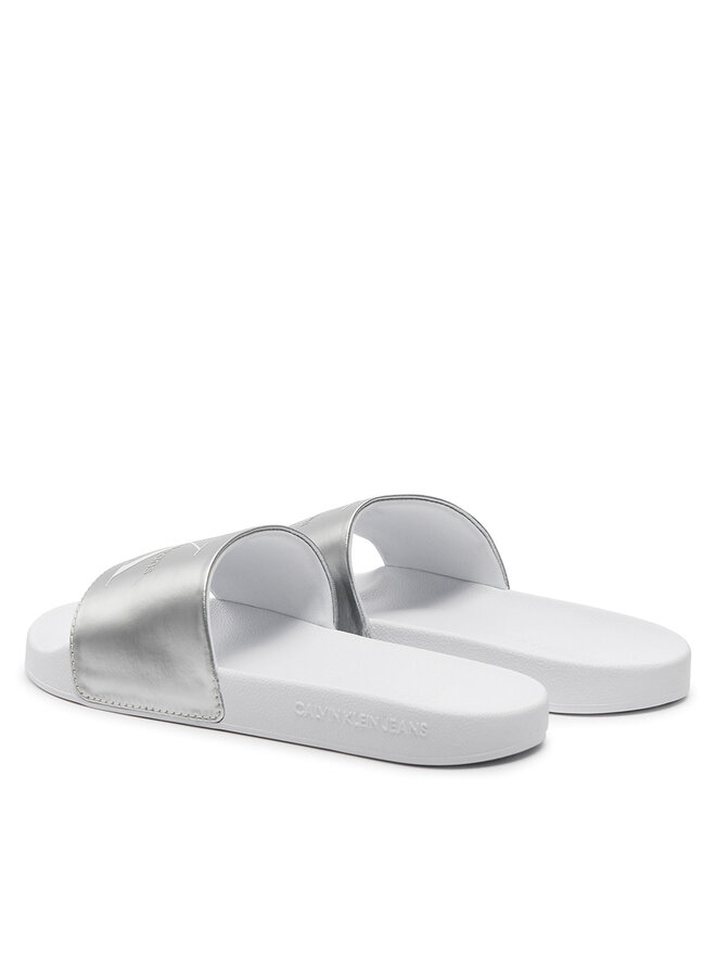 Calvin Klein Jeans Pantoletten Calvin Klein Jeans Slide Ny Pearl YW0YW01243 Silberfarben