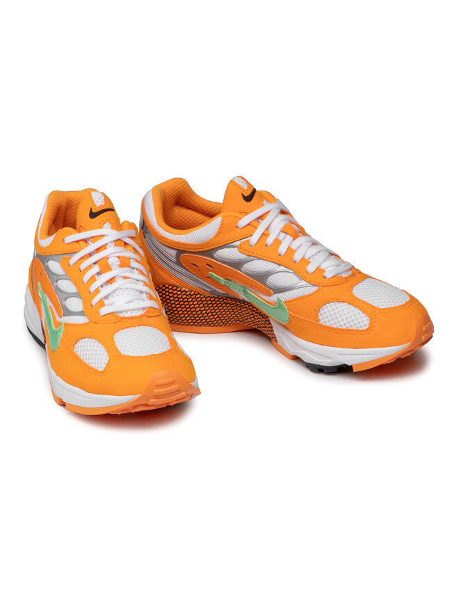 nike air ghost racer in orange peel