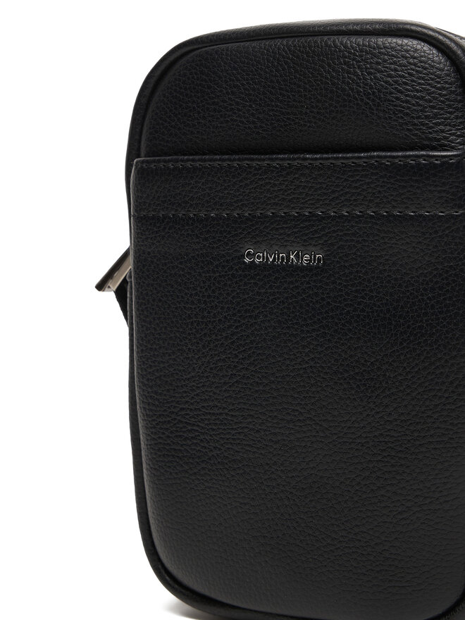 Calvin Klein Umhängetasche Calvin Klein Raised Slim Reporter LV04D3278G Schwarz