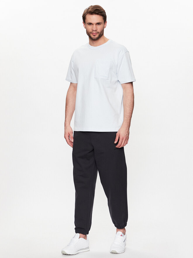 New Balance New Balance Póló MT23567 Kék Relaxed Fit
